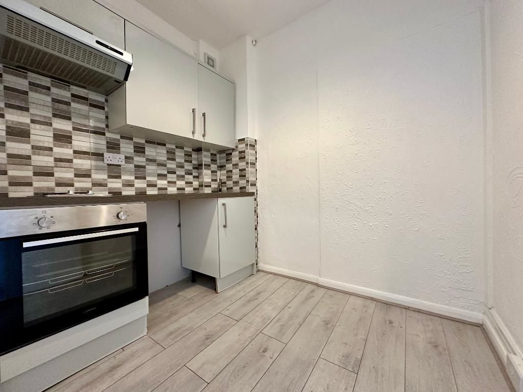 RESIDENTIAL INVESTMENT: A SUBSTANTIAL FREEHOLD BUILDING WITH CAR PARK USED AS A HOUSE OF MULTIPLE OCCUPANCY COMPRISING 9 STUDIOS AND 10 ROOMS
