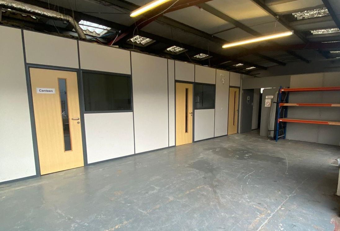 INDUSTRIAL OPPORTUNITY: A VACANT LONG LEASEHOLD PROPERTY WITH FORECOURT PARKING BELIEVED TO HAVE A POTENTIAL RENTAL INCOME OF £25,000 PER ANNUM 