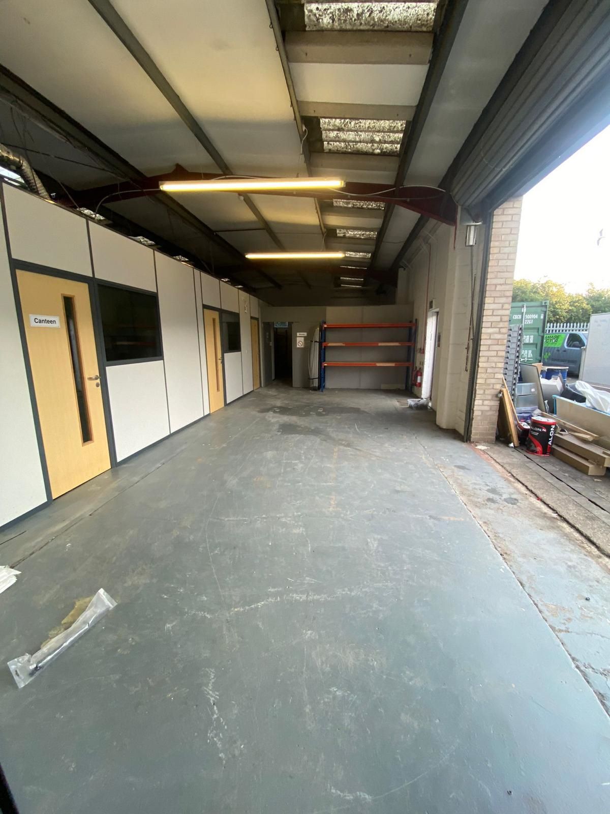 INDUSTRIAL OPPORTUNITY: A VACANT LONG LEASEHOLD PROPERTY WITH FORECOURT PARKING BELIEVED TO HAVE A POTENTIAL RENTAL INCOME OF £25,000 PER ANNUM 