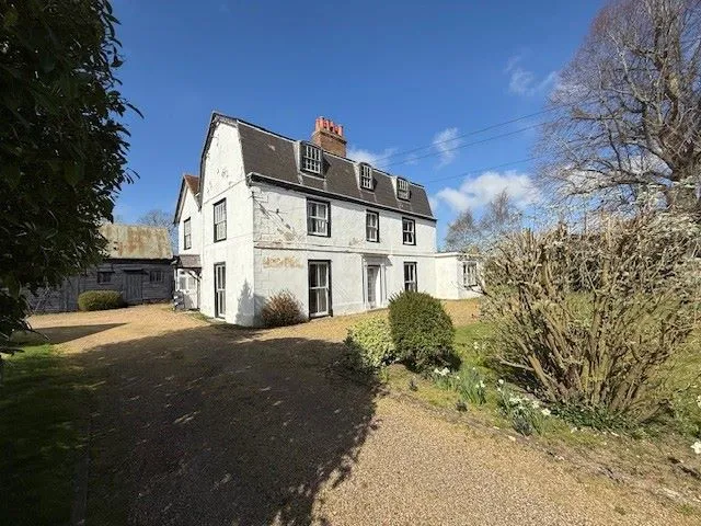 REFURBISHMENT/REDEVELOPMENT: AVAILABLE NOW WITH ALL OFFERS UNDER AUCTION CONDITIONS CONSIDERED: A VACANT SUBSTANTIAL DETACHED PERIOD HOUSE WITH OUTBUILDINGS ON A 1.9 ACRE PLOT IN NEED OF RENOVATION  