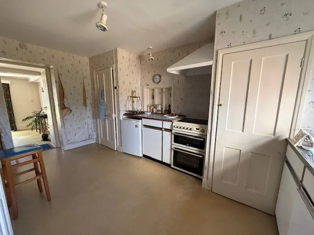 REFURBISHMENT/REDEVELOPMENT: AVAILABLE NOW WITH ALL OFFERS UNDER AUCTION CONDITIONS CONSIDERED: A VACANT SUBSTANTIAL DETACHED PERIOD HOUSE WITH OUTBUILDINGS ON A 1.9 ACRE PLOT IN NEED OF RENOVATION  