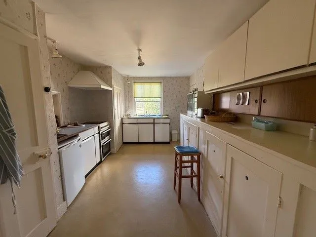 REFURBISHMENT/REDEVELOPMENT: AVAILABLE NOW WITH ALL OFFERS UNDER AUCTION CONDITIONS CONSIDERED: A VACANT SUBSTANTIAL DETACHED PERIOD HOUSE WITH OUTBUILDINGS ON A 1.9 ACRE PLOT IN NEED OF RENOVATION  