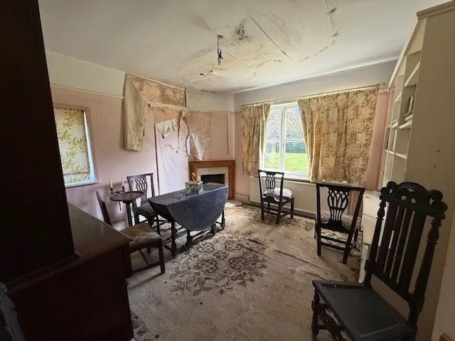 REFURBISHMENT/REDEVELOPMENT: AVAILABLE NOW WITH ALL OFFERS UNDER AUCTION CONDITIONS CONSIDERED: A VACANT SUBSTANTIAL DETACHED PERIOD HOUSE WITH OUTBUILDINGS ON A 1.9 ACRE PLOT IN NEED OF RENOVATION  
