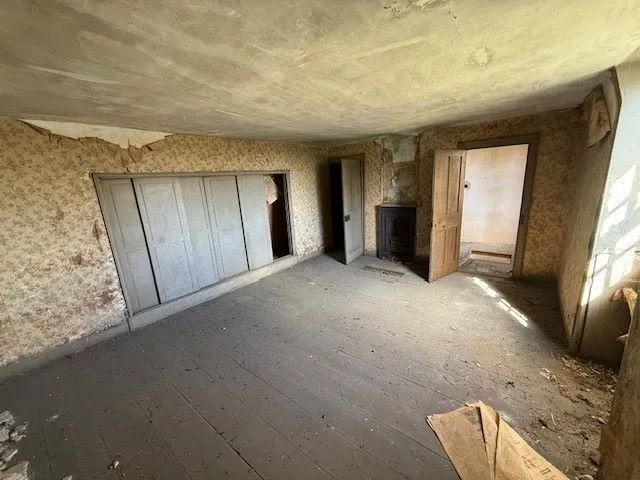 REFURBISHMENT/REDEVELOPMENT: AVAILABLE NOW WITH ALL OFFERS UNDER AUCTION CONDITIONS CONSIDERED: A VACANT SUBSTANTIAL DETACHED PERIOD HOUSE WITH OUTBUILDINGS ON A 1.9 ACRE PLOT IN NEED OF RENOVATION  
