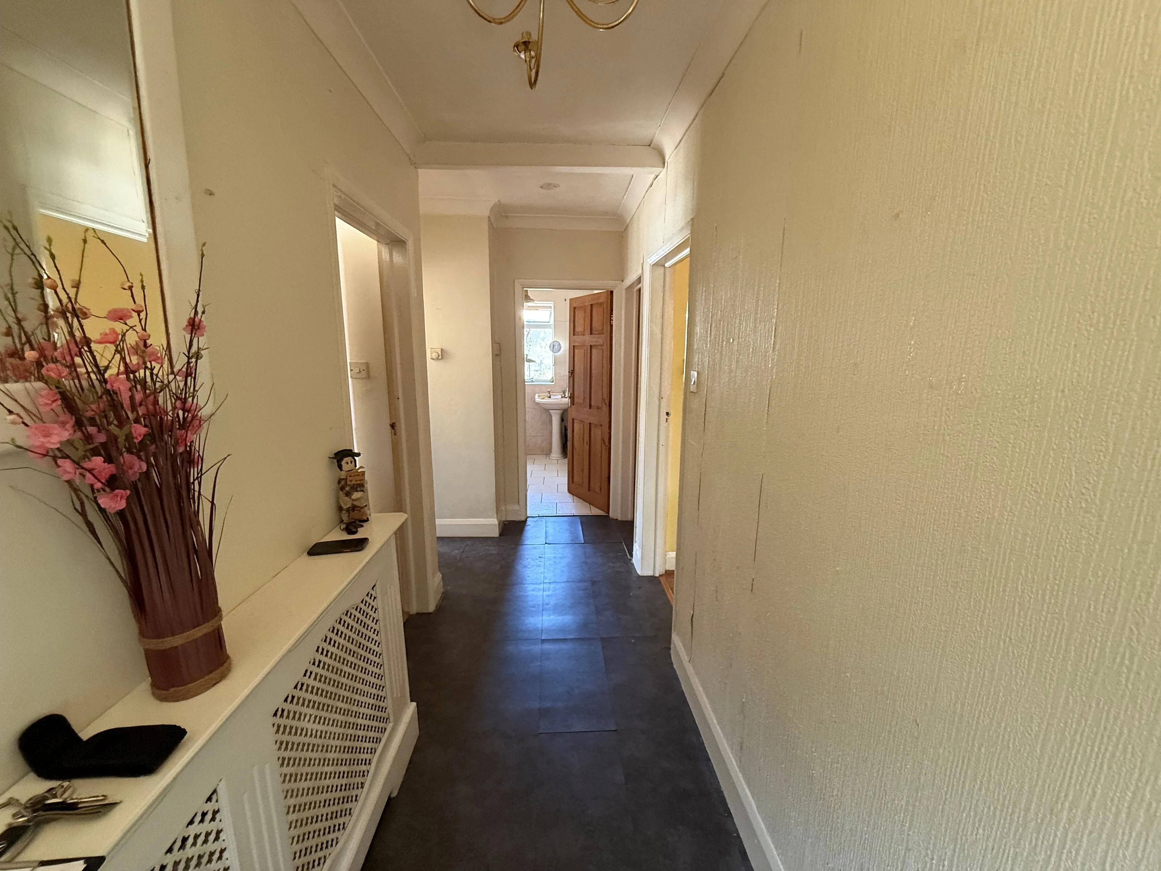 REFURBISHMENT OPPORTUNITY: A FREEHOLD DETACHED BUNGALOW ON A CORNER PLOT WITH POTENTIAL FOR IMPROVEMENT/EXTENSION SUBJECT TO PLANNING