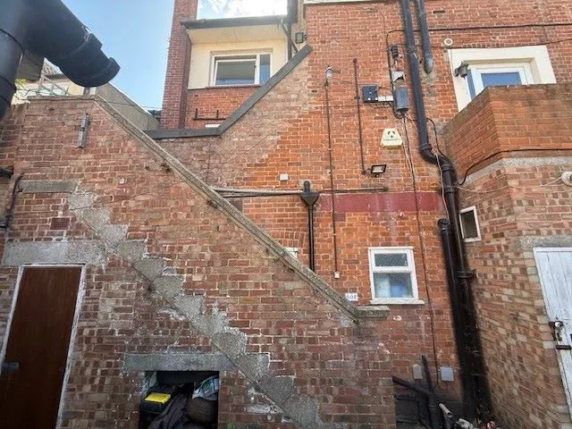 MIXED USE INVESTMENT: A FREEHOLD BUILDING FULLY LET AND PRODUCING AN ANNUAL INCOME OF AROUND £48,000. A YIELD OF AROUND 12% OF THE GUIDE PRICE  