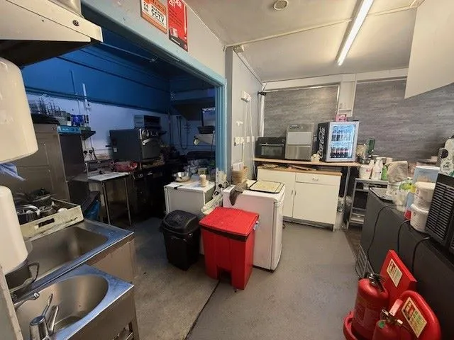 MIXED USE INVESTMENT: A FREEHOLD BUILDING FULLY LET AND PRODUCING AN ANNUAL INCOME OF AROUND £48,000. A YIELD OF AROUND 12% OF THE GUIDE PRICE  