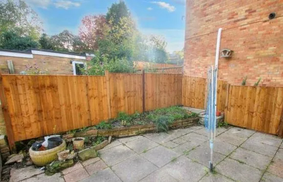 RESIDENTIAL: A VACANT LEASEHOLD ONE BEDROOM GROUND FLOOR MAISONETTE BENEFITING FROM ITS OWN DRIVEWAY, GARAGE AND COURTYARD GARDEN.