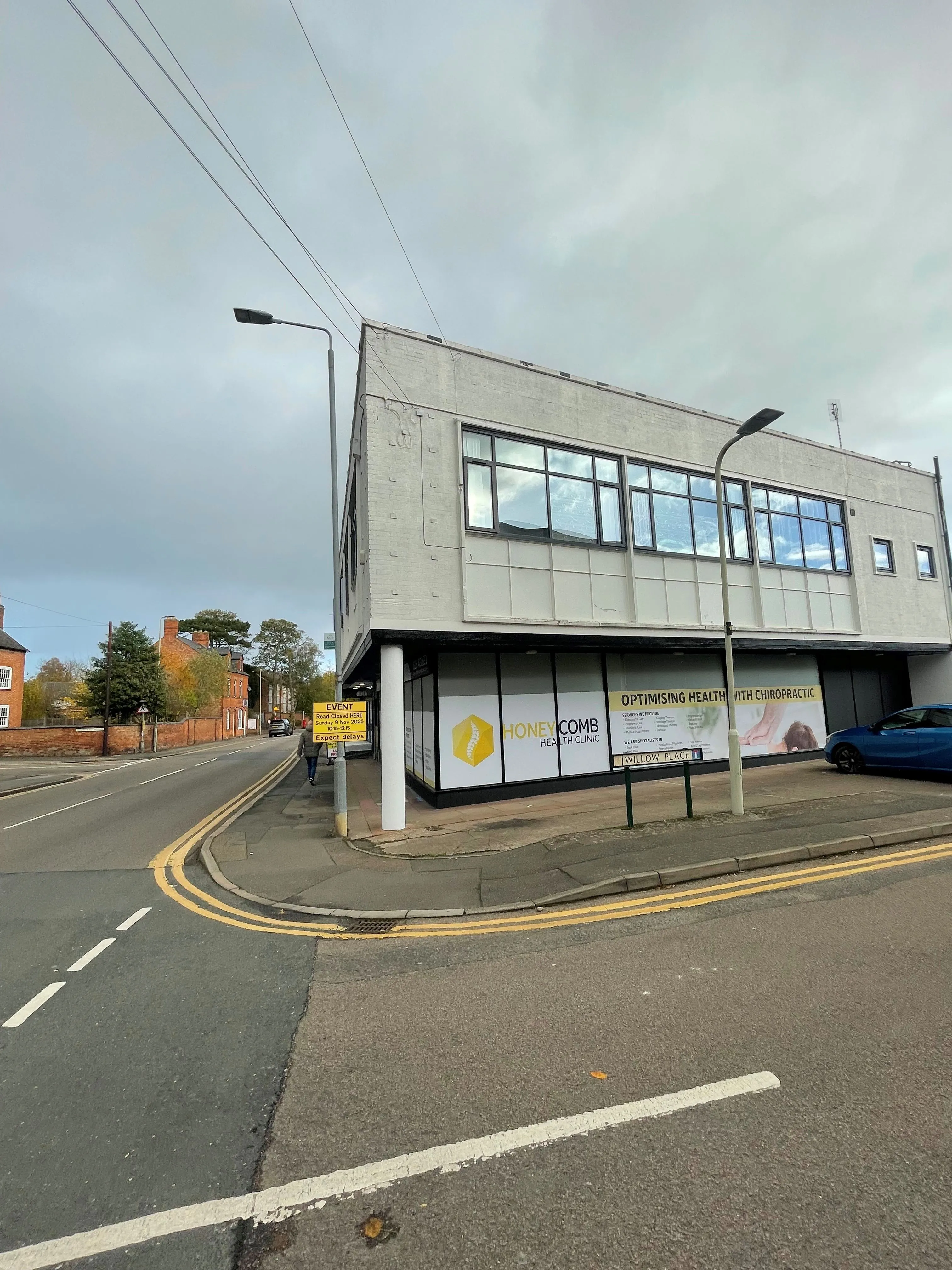 MIXED USE INVESTMENT OPPORTUNITY: A FREEHOLD PROPERTY COMPRISING TWO COMMERCIAL SHOPS WITH FIVE FLATS ABOVE AND CAR PARK TO THE REAR