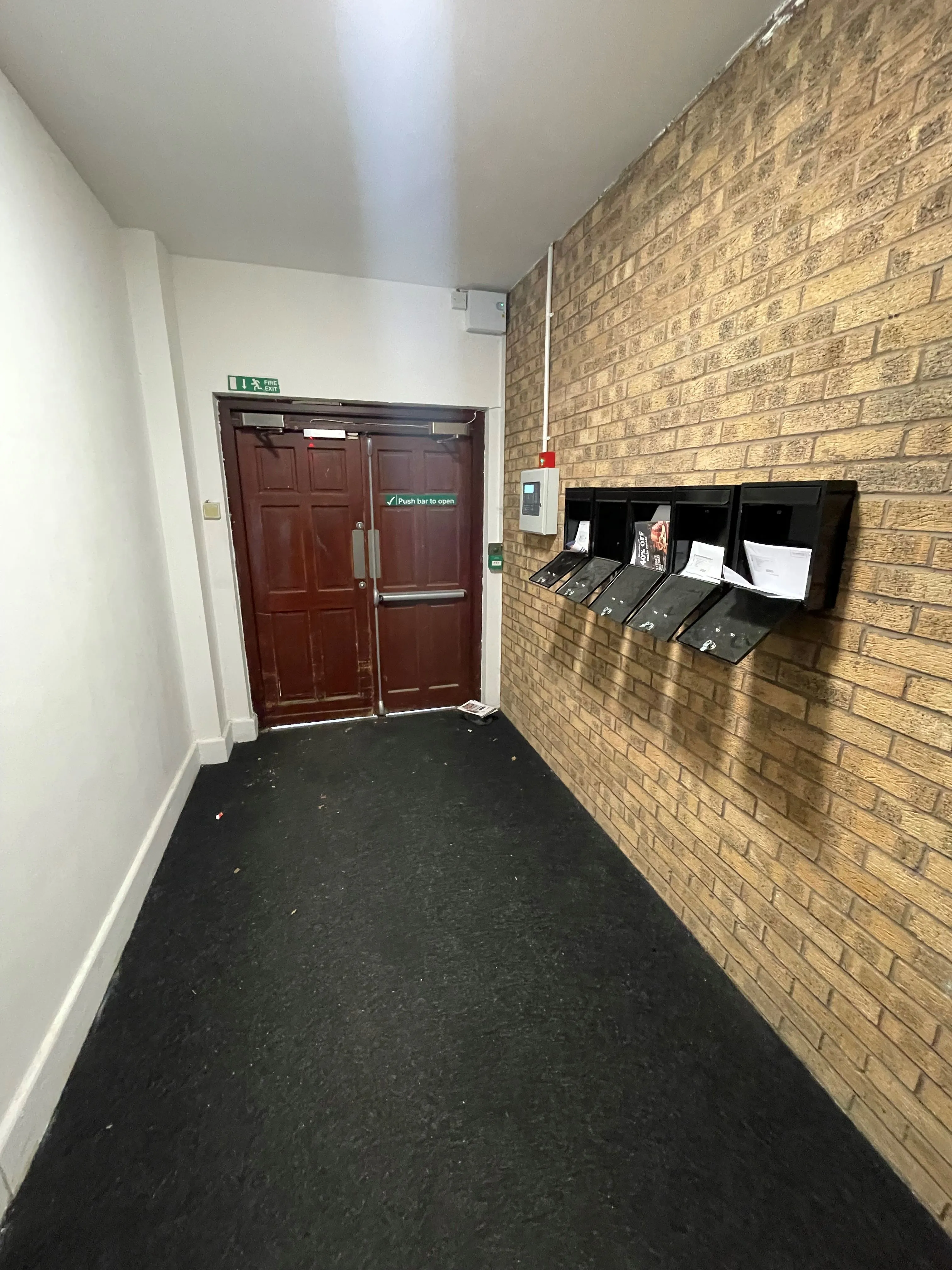 MIXED USE INVESTMENT OPPORTUNITY: A FREEHOLD PROPERTY COMPRISING TWO COMMERCIAL SHOPS WITH FIVE FLATS ABOVE AND CAR PARK TO THE REAR