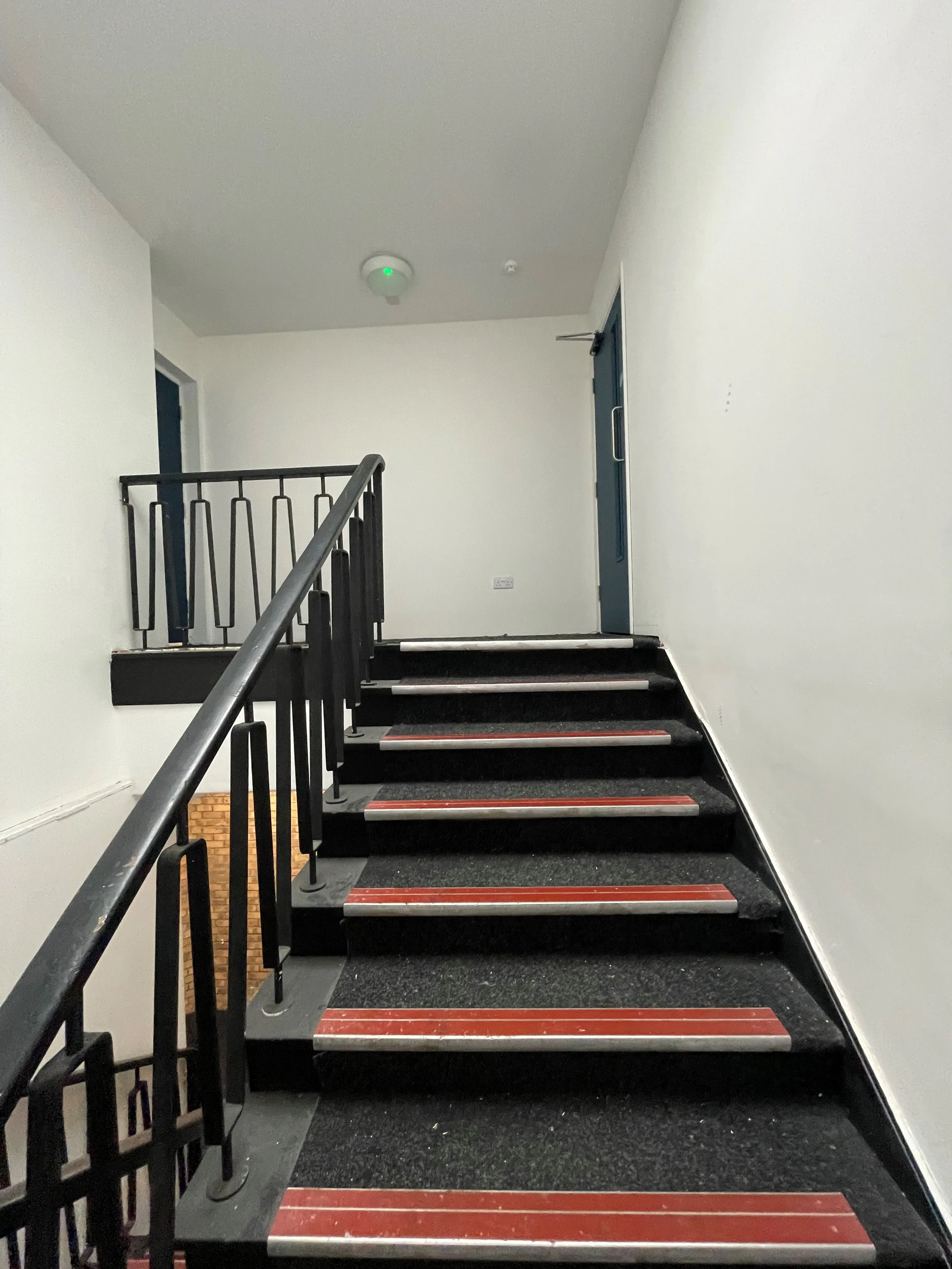 MIXED USE INVESTMENT OPPORTUNITY: A FREEHOLD PROPERTY COMPRISING TWO COMMERCIAL SHOPS WITH FIVE FLATS ABOVE AND CAR PARK TO THE REAR