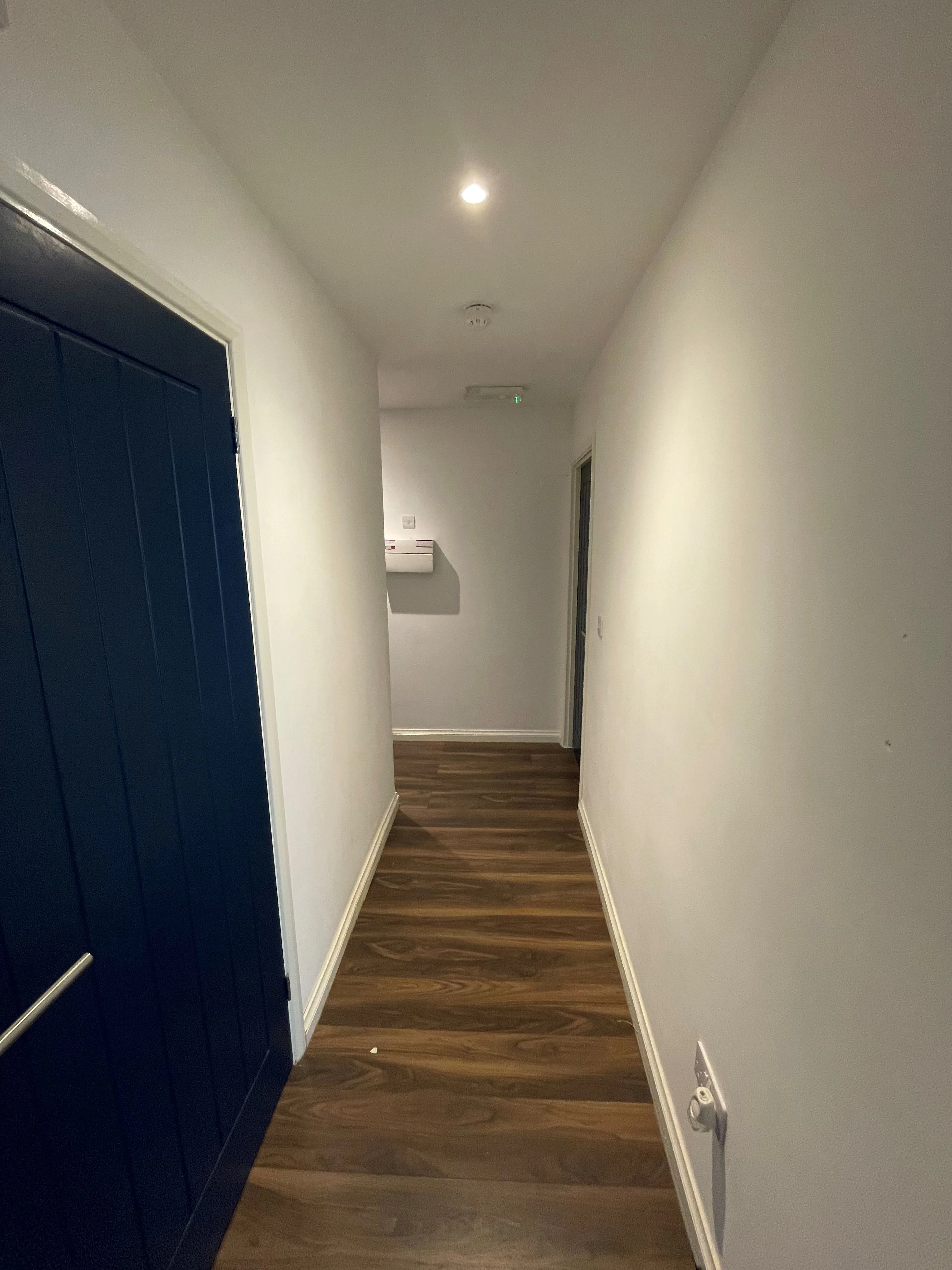 MIXED USE INVESTMENT OPPORTUNITY: A FREEHOLD PROPERTY COMPRISING TWO COMMERCIAL SHOPS WITH FIVE FLATS ABOVE AND CAR PARK TO THE REAR