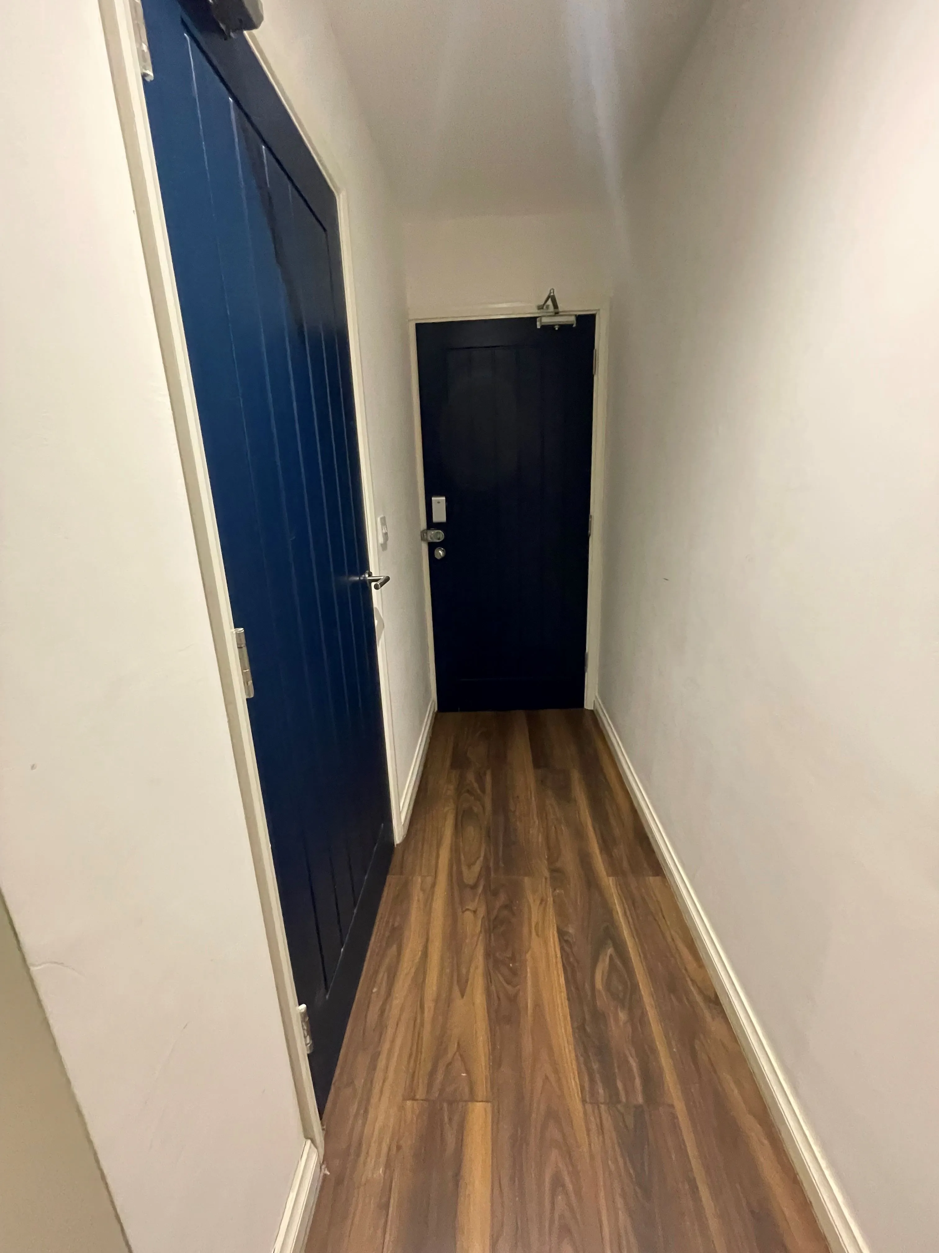 MIXED USE INVESTMENT OPPORTUNITY: A FREEHOLD PROPERTY COMPRISING TWO COMMERCIAL SHOPS WITH FIVE FLATS ABOVE AND CAR PARK TO THE REAR