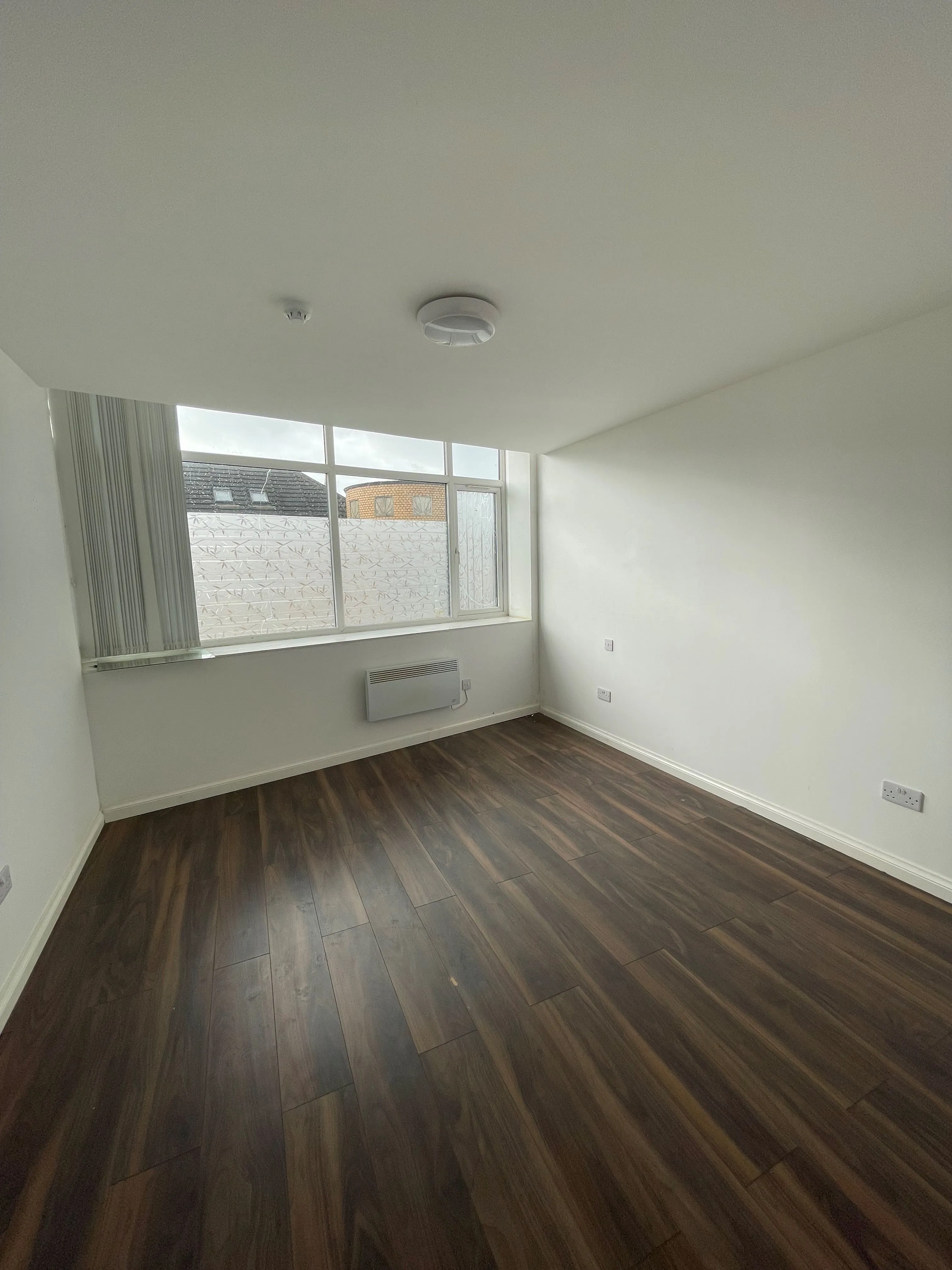 MIXED USE INVESTMENT OPPORTUNITY: A FREEHOLD PROPERTY COMPRISING TWO COMMERCIAL SHOPS WITH FIVE FLATS ABOVE AND CAR PARK TO THE REAR