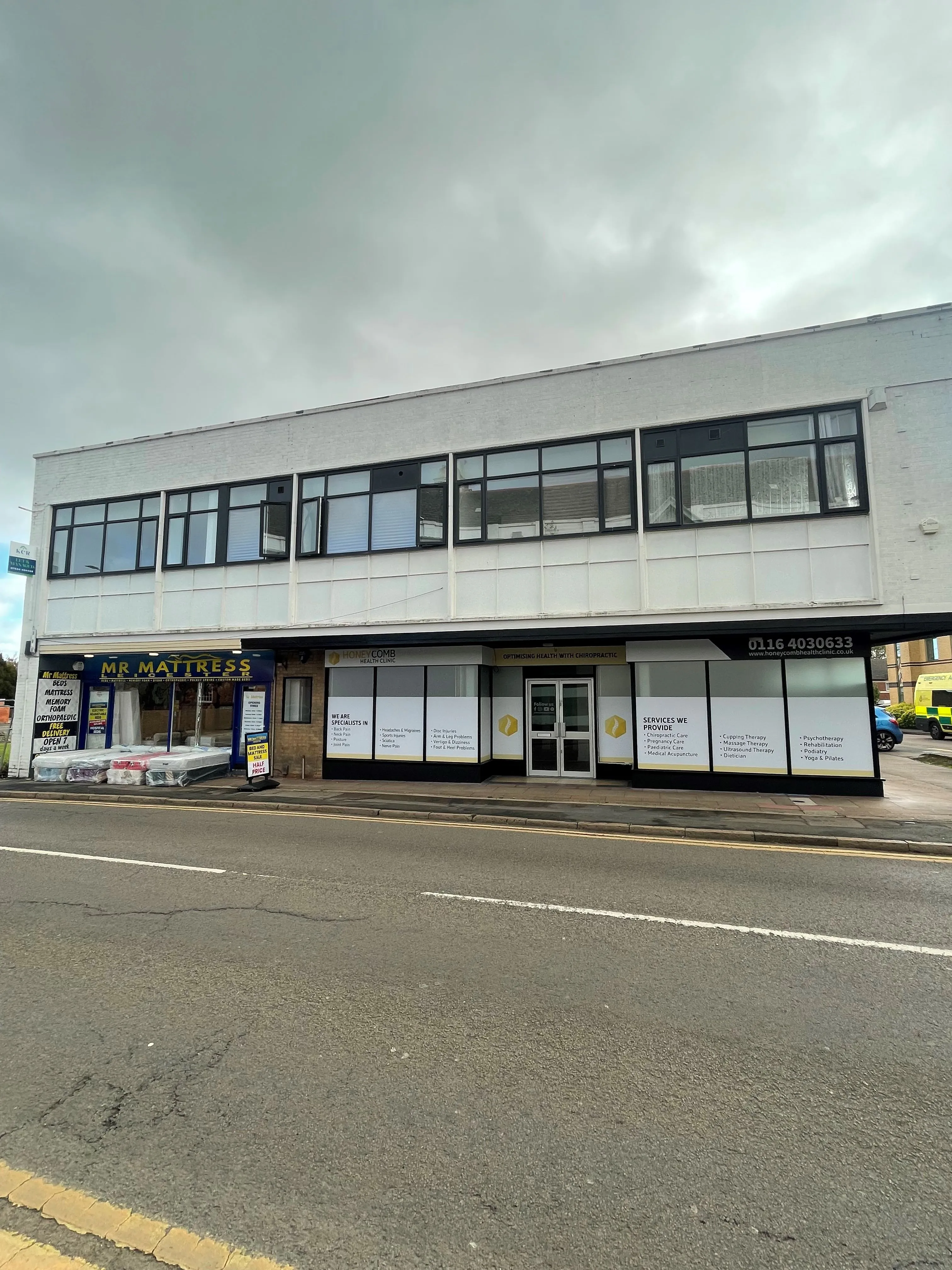 MIXED USE INVESTMENT OPPORTUNITY: A FREEHOLD PROPERTY COMPRISING TWO COMMERCIAL SHOPS WITH FIVE FLATS ABOVE AND CAR PARK TO THE REAR