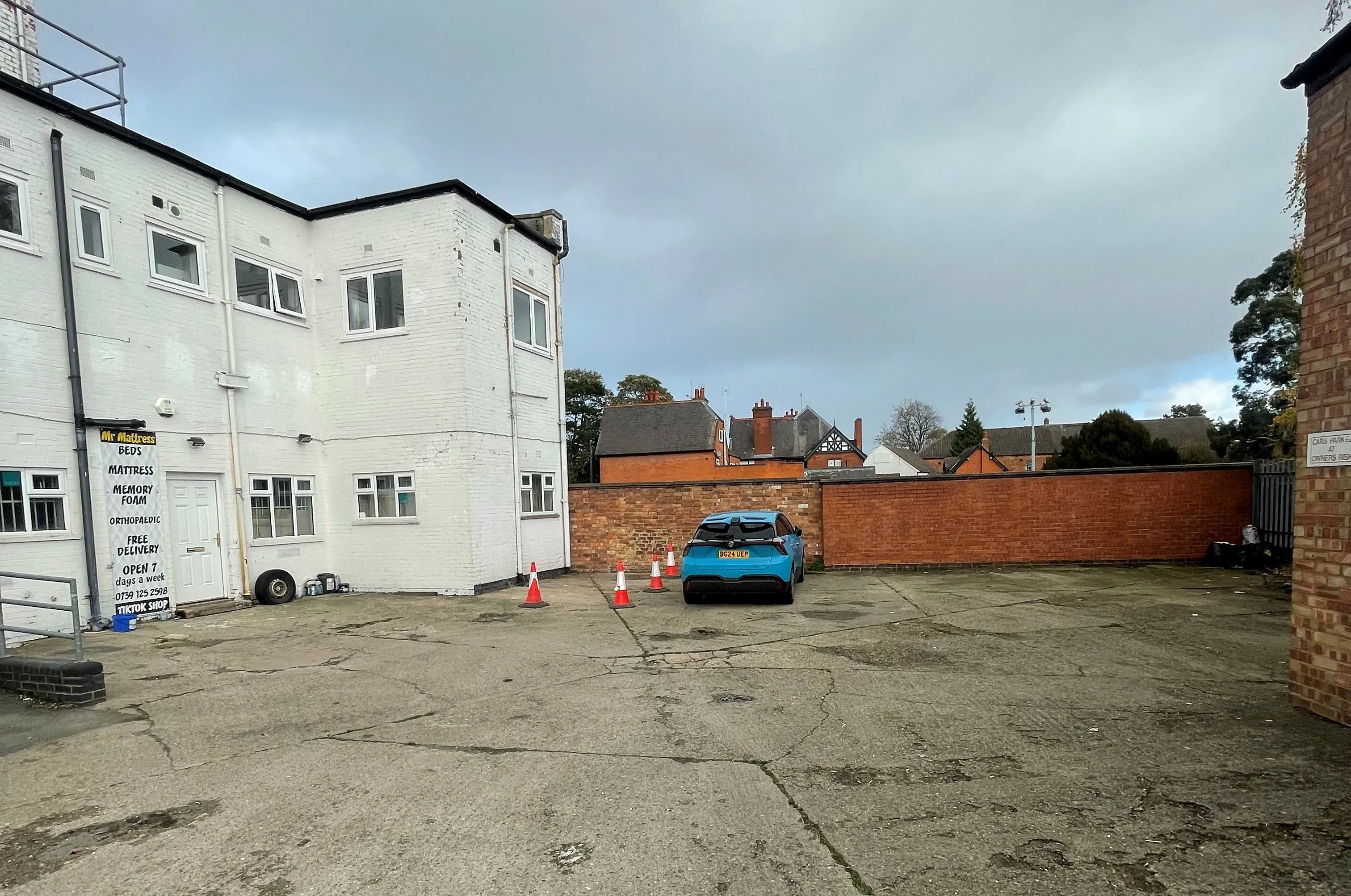 MIXED USE INVESTMENT OPPORTUNITY: A FREEHOLD PROPERTY COMPRISING TWO COMMERCIAL SHOPS WITH FIVE FLATS ABOVE AND CAR PARK TO THE REAR