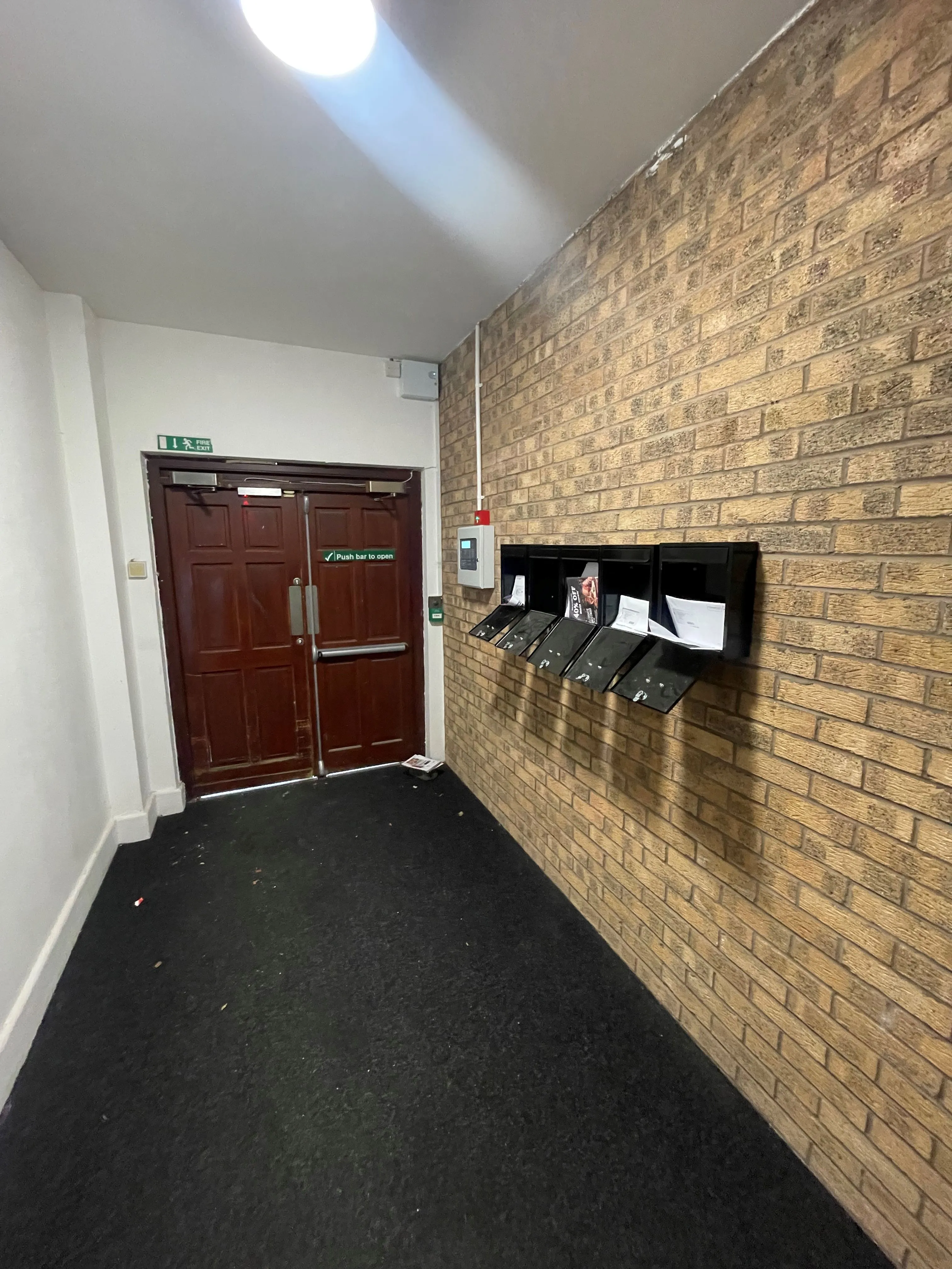 MIXED USE INVESTMENT OPPORTUNITY: A FREEHOLD PROPERTY COMPRISING TWO COMMERCIAL SHOPS WITH FIVE FLATS ABOVE AND CAR PARK TO THE REAR