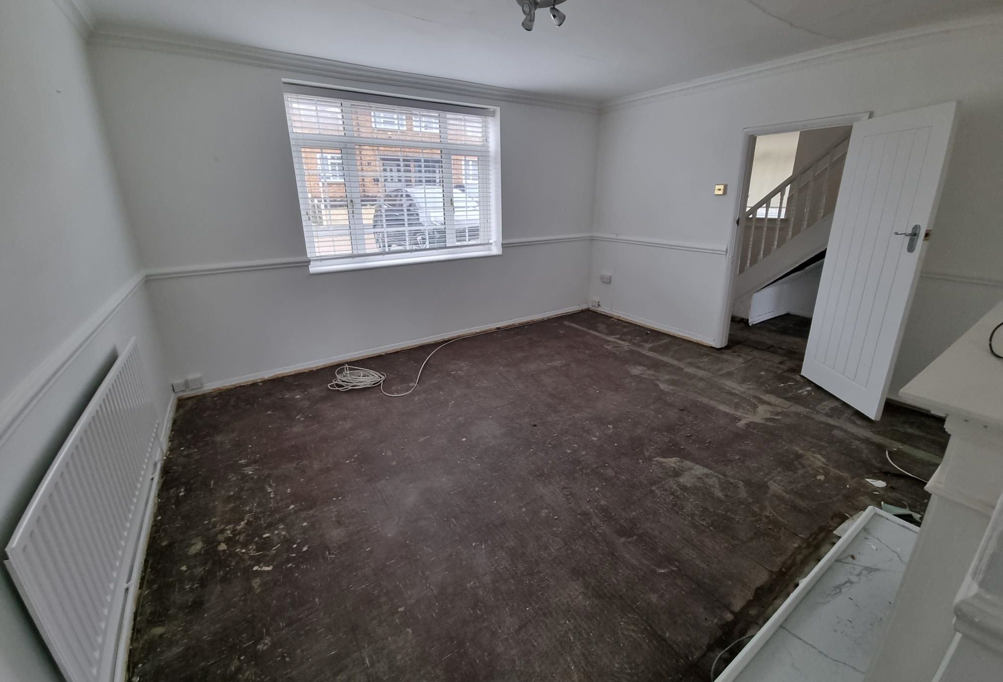 RESIDENTIAL INVESTMENT: A VACANT FREEHOLD THREE BEDROOM END TERRACE HOUSE IN HAROLD HILL CLOSE TO A12 AND M25 IN NEED OF SOME REFURBISHMENT