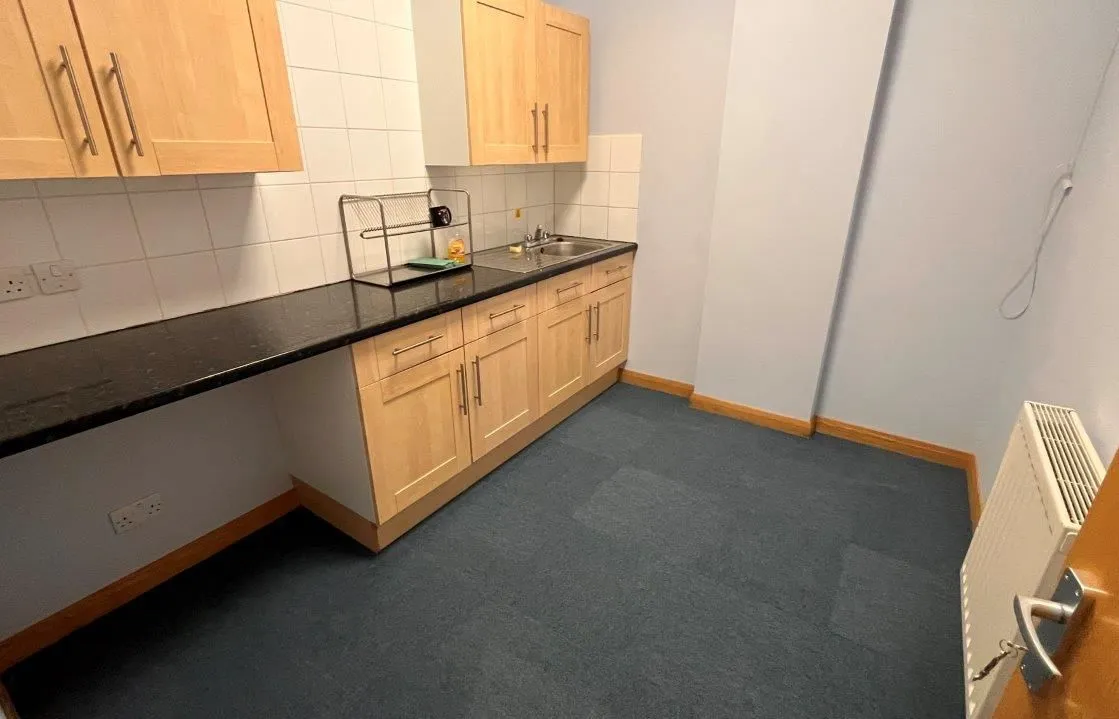 COMMERCIAL  OFFICE INVESTMENT:  A TERRACED F1 USE INDUSTRIAL PREMISES WITH NINE PARKING SPACES MEASURING 6,118 SQ FT LOCATED CLOSE TO TOWN CENTRE