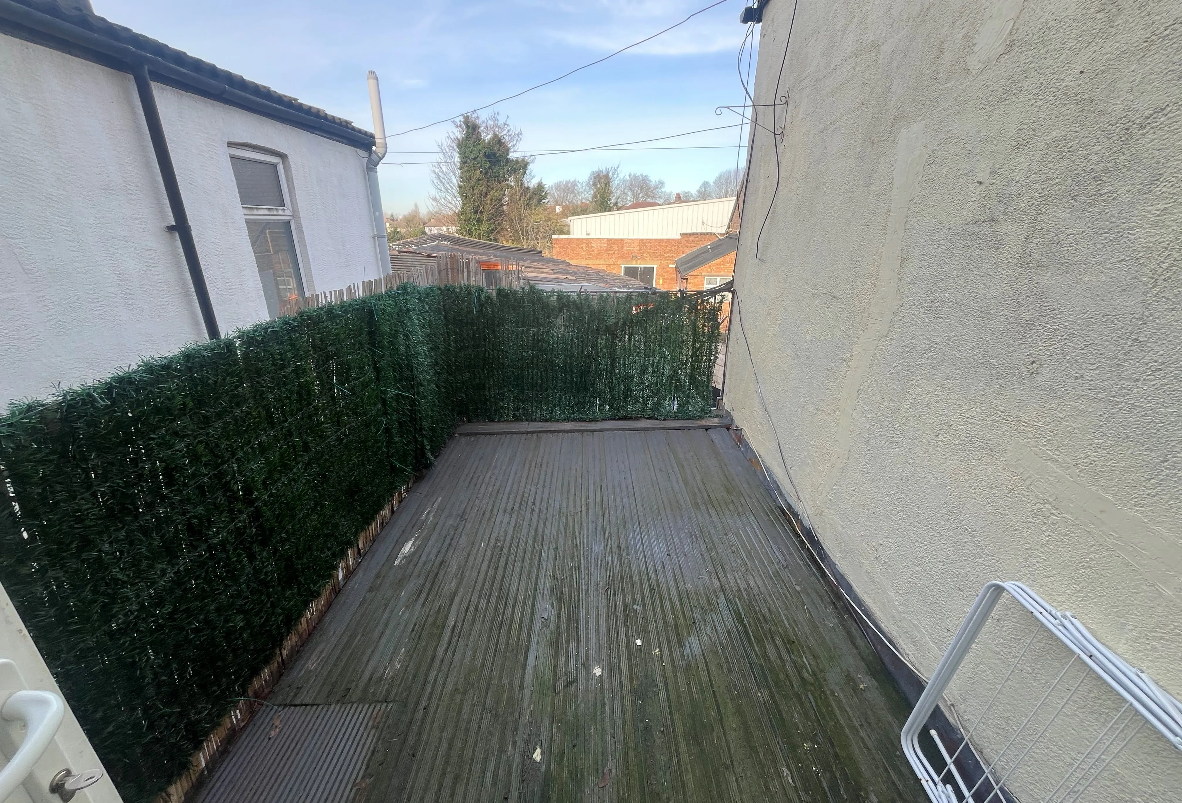 INVESTMENT/DEVELOPMENT: A FREEHOLD BUILDING OF 3 FLATS AND COMMERCIAL WORKSHOP WITH REAR YARD THAT BENEFITS FROM PLANNING PERMISSION