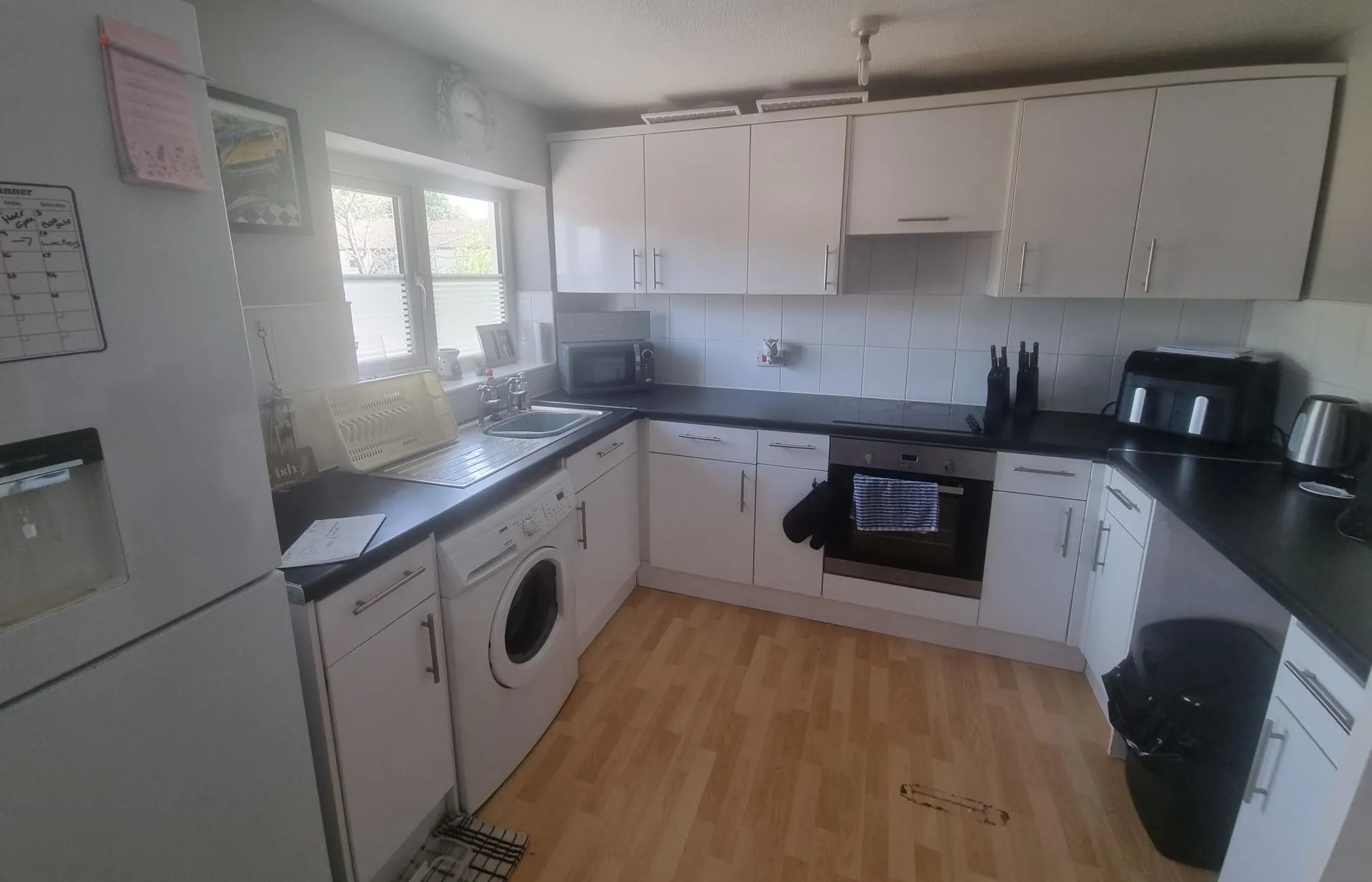 BUY TO LET INVESTMENT: FIRST FLOOR LEASEHOLD FLAT CLOSE TO LAINDON RAILWAY STATION WITH A TENANT IN OCCUPATION PRODUCING AN INCOME OF £10,200 PA