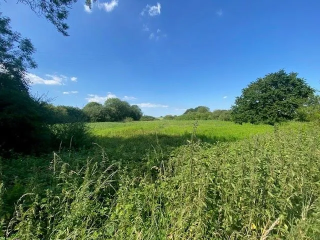 LAND INVESTMENT: A VACANT FREEHOLD PLOT OF LAND IN A POPULAR SEMI RURAL LOCATION OPPOSITE RESIDENTIAL PROPERTIES MEASURING 4 ACRES APPROX