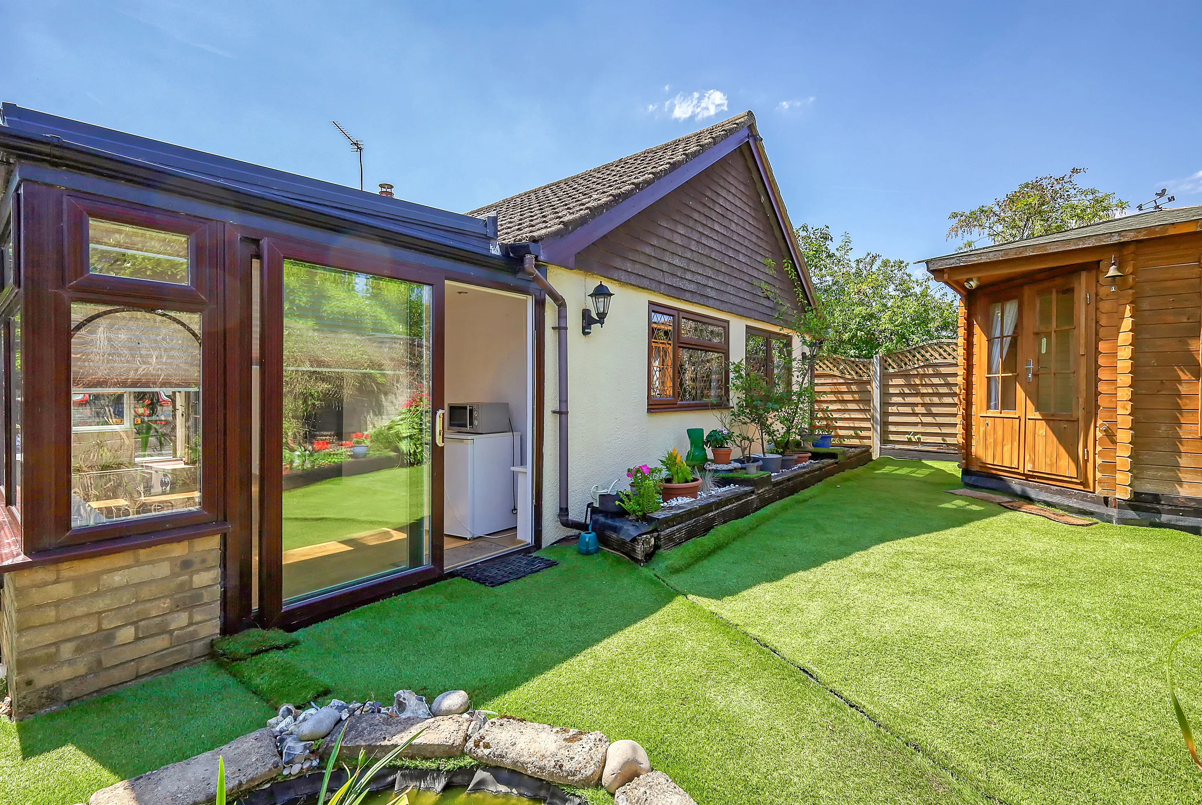 REFURBISHMENT OPPORTUNITY: A VACANT FREEHOLD DETACHED TIMBER FRAMED BUNGALOW IN A POPULAR VILLAGE IN NEED OF MODERNISATION AND IMPROVEMENT 