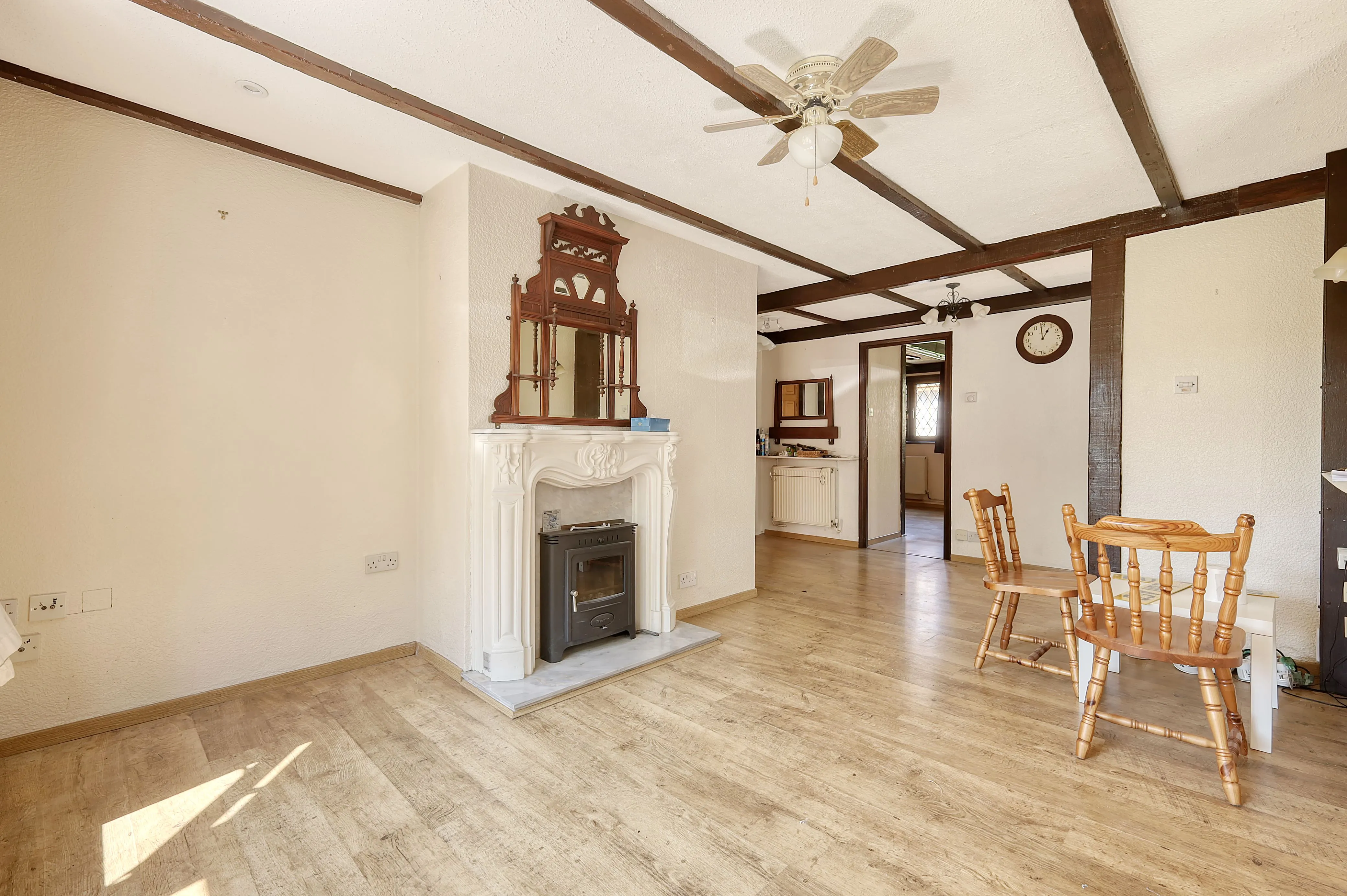 REFURBISHMENT OPPORTUNITY: A VACANT FREEHOLD DETACHED TIMBER FRAMED BUNGALOW IN A POPULAR VILLAGE IN NEED OF MODERNISATION AND IMPROVEMENT 