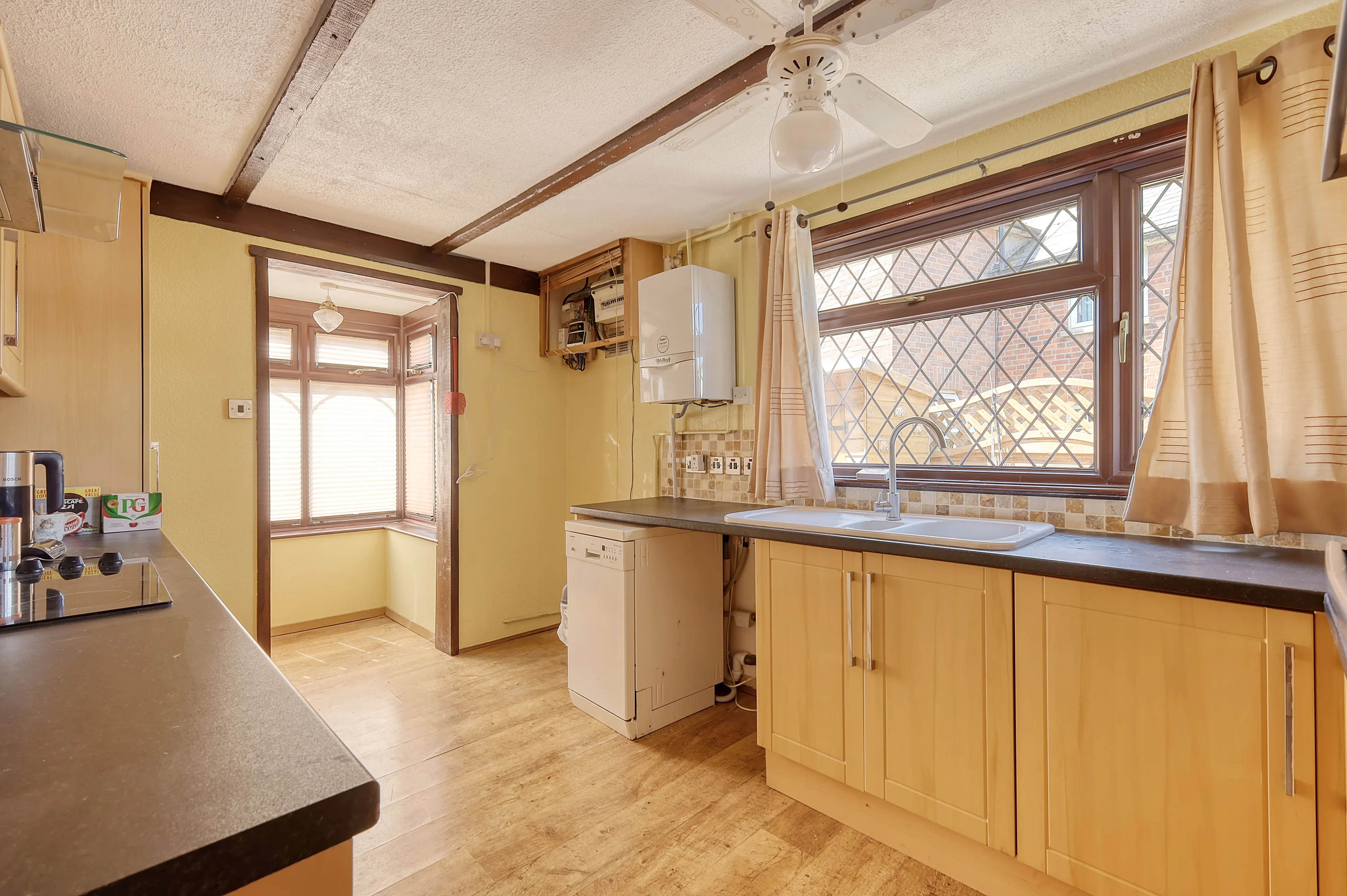 REFURBISHMENT OPPORTUNITY: A VACANT FREEHOLD DETACHED TIMBER FRAMED BUNGALOW IN A POPULAR VILLAGE IN NEED OF MODERNISATION AND IMPROVEMENT 