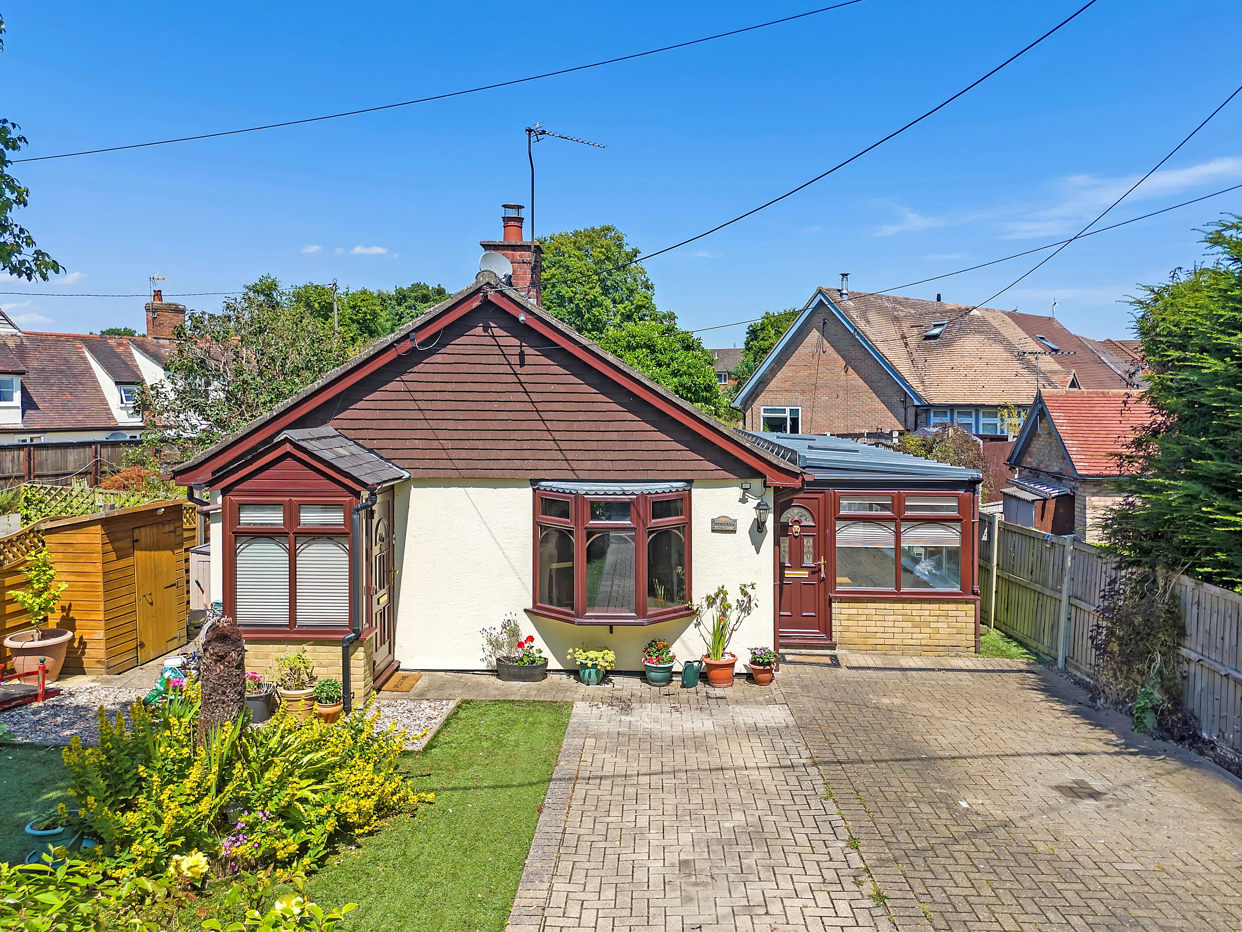 REFURBISHMENT OPPORTUNITY: A VACANT FREEHOLD DETACHED TIMBER FRAMED BUNGALOW IN A POPULAR VILLAGE IN NEED OF MODERNISATION AND IMPROVEMENT 