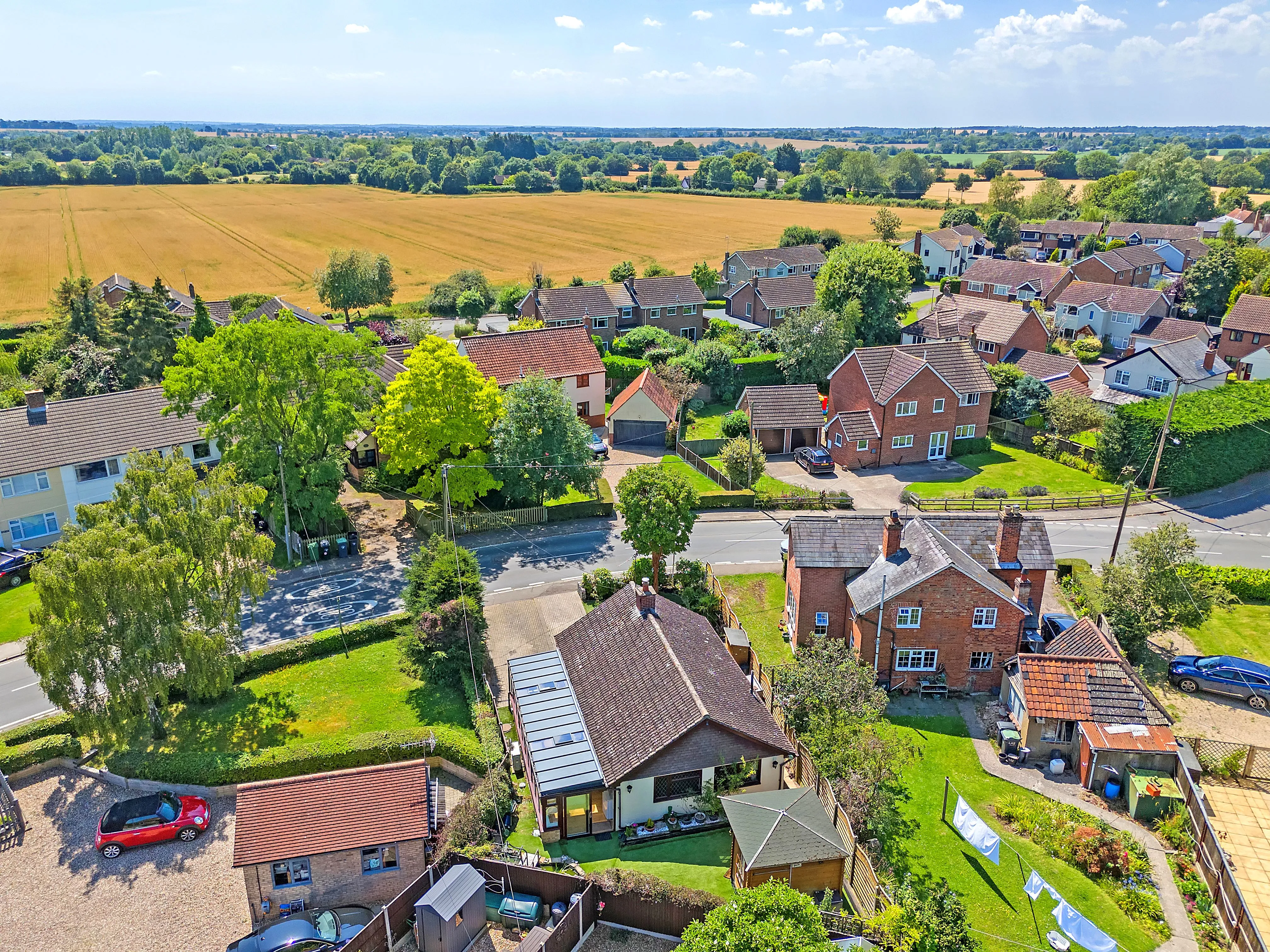 REFURBISHMENT OPPORTUNITY: A VACANT FREEHOLD DETACHED TIMBER FRAMED BUNGALOW IN A POPULAR VILLAGE IN NEED OF MODERNISATION AND IMPROVEMENT 