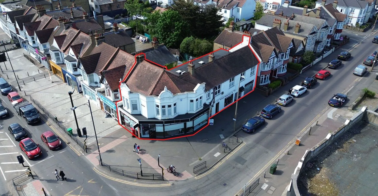 FREEHOLD MIXED USE INVESTMENT: CONSISTING OF FOUR COMMERCIAL UNITS AND ONE FIRST FLOOR OFFICE SUITE SITUATED ON A PROMINENT CORNER LOCATION