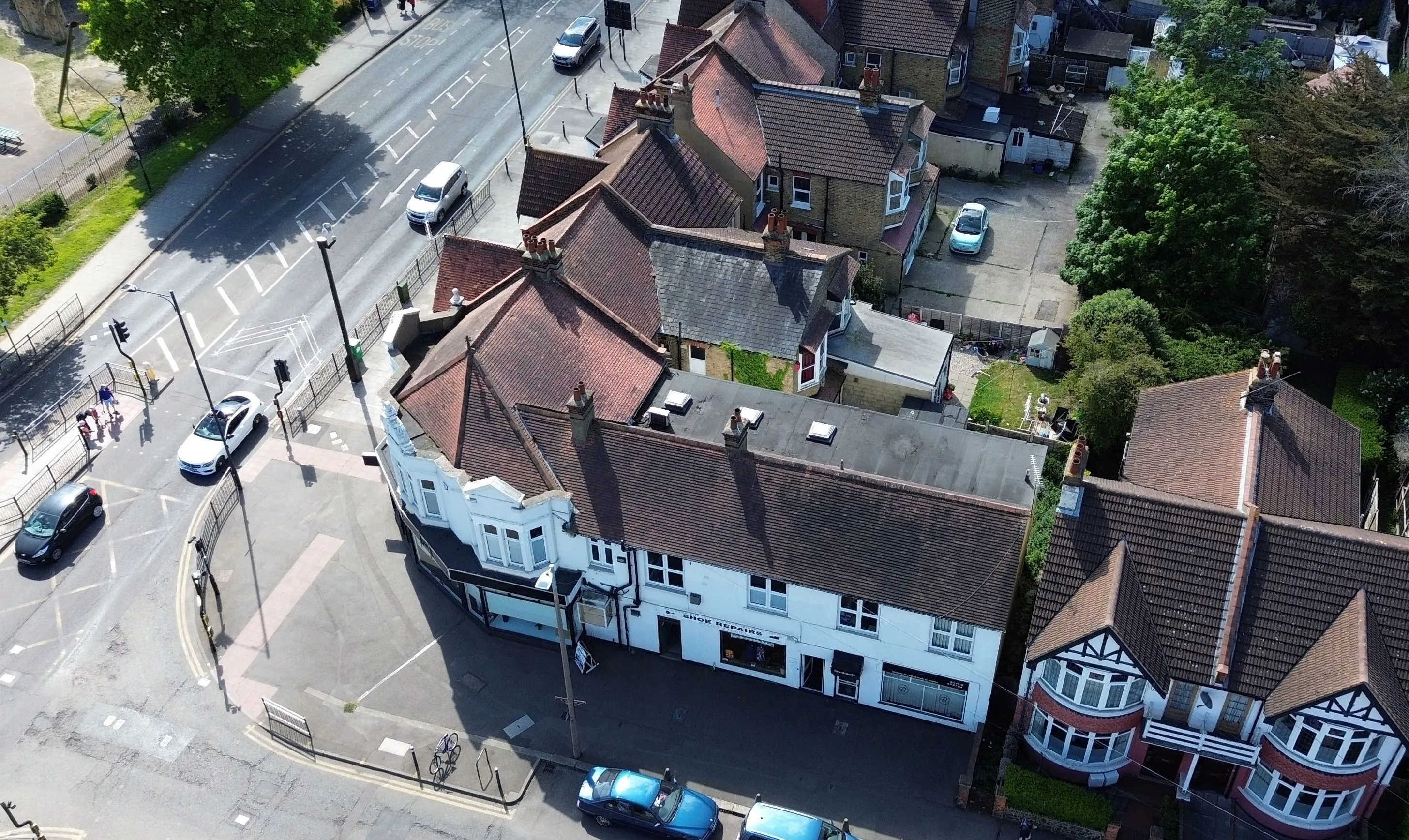 FREEHOLD MIXED USE INVESTMENT: CONSISTING OF FOUR COMMERCIAL UNITS AND ONE FIRST FLOOR OFFICE SUITE SITUATED ON A PROMINENT CORNER LOCATION