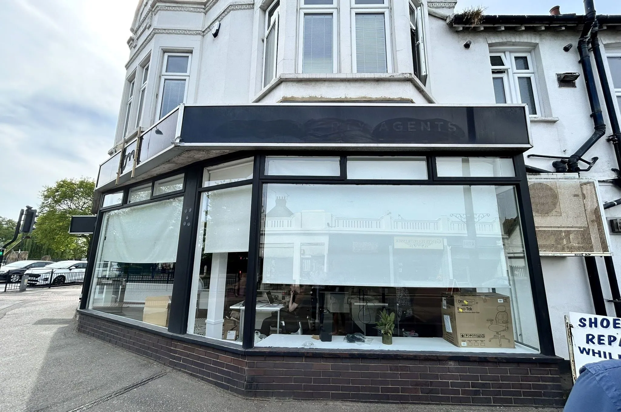 FREEHOLD MIXED USE INVESTMENT: CONSISTING OF FOUR COMMERCIAL UNITS AND ONE FIRST FLOOR OFFICE SUITE SITUATED ON A PROMINENT CORNER LOCATION