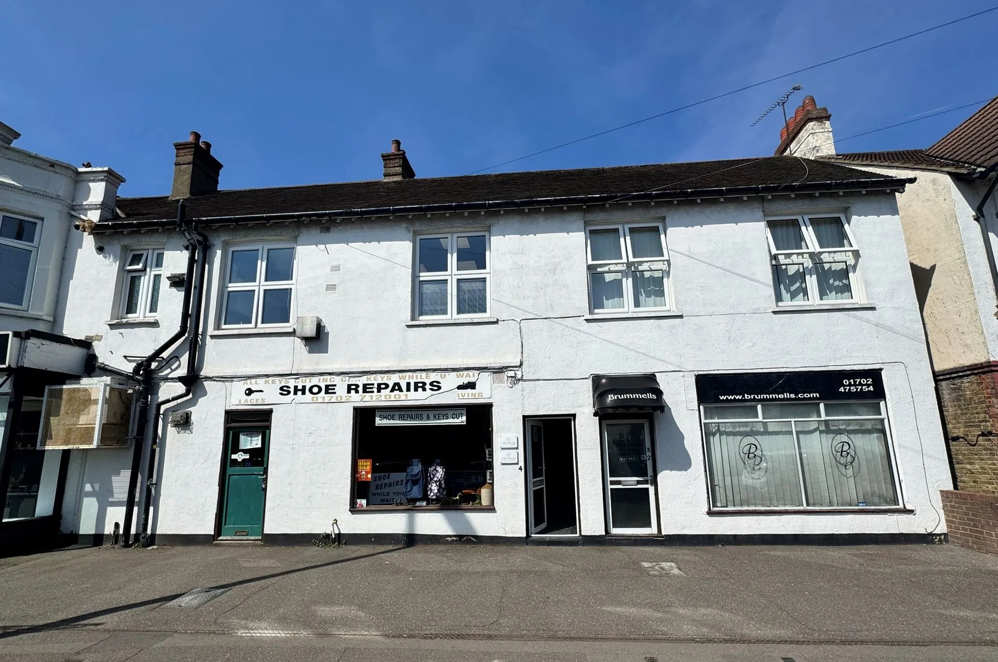 FREEHOLD MIXED USE INVESTMENT: CONSISTING OF FOUR COMMERCIAL UNITS AND ONE FIRST FLOOR OFFICE SUITE SITUATED ON A PROMINENT CORNER LOCATION