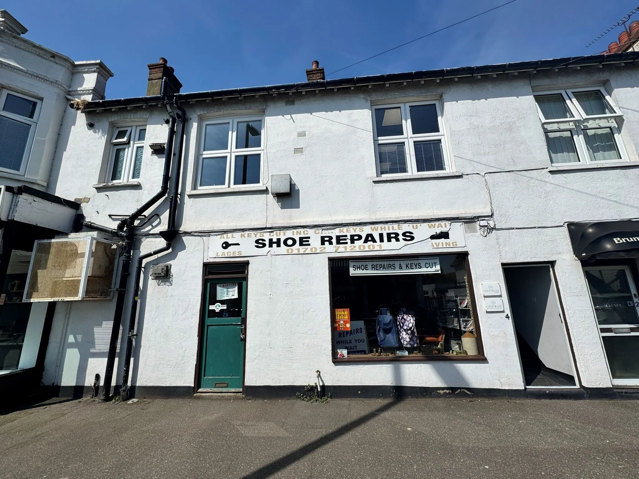 FREEHOLD MIXED USE INVESTMENT: CONSISTING OF FOUR COMMERCIAL UNITS AND ONE FIRST FLOOR OFFICE SUITE SITUATED ON A PROMINENT CORNER LOCATION