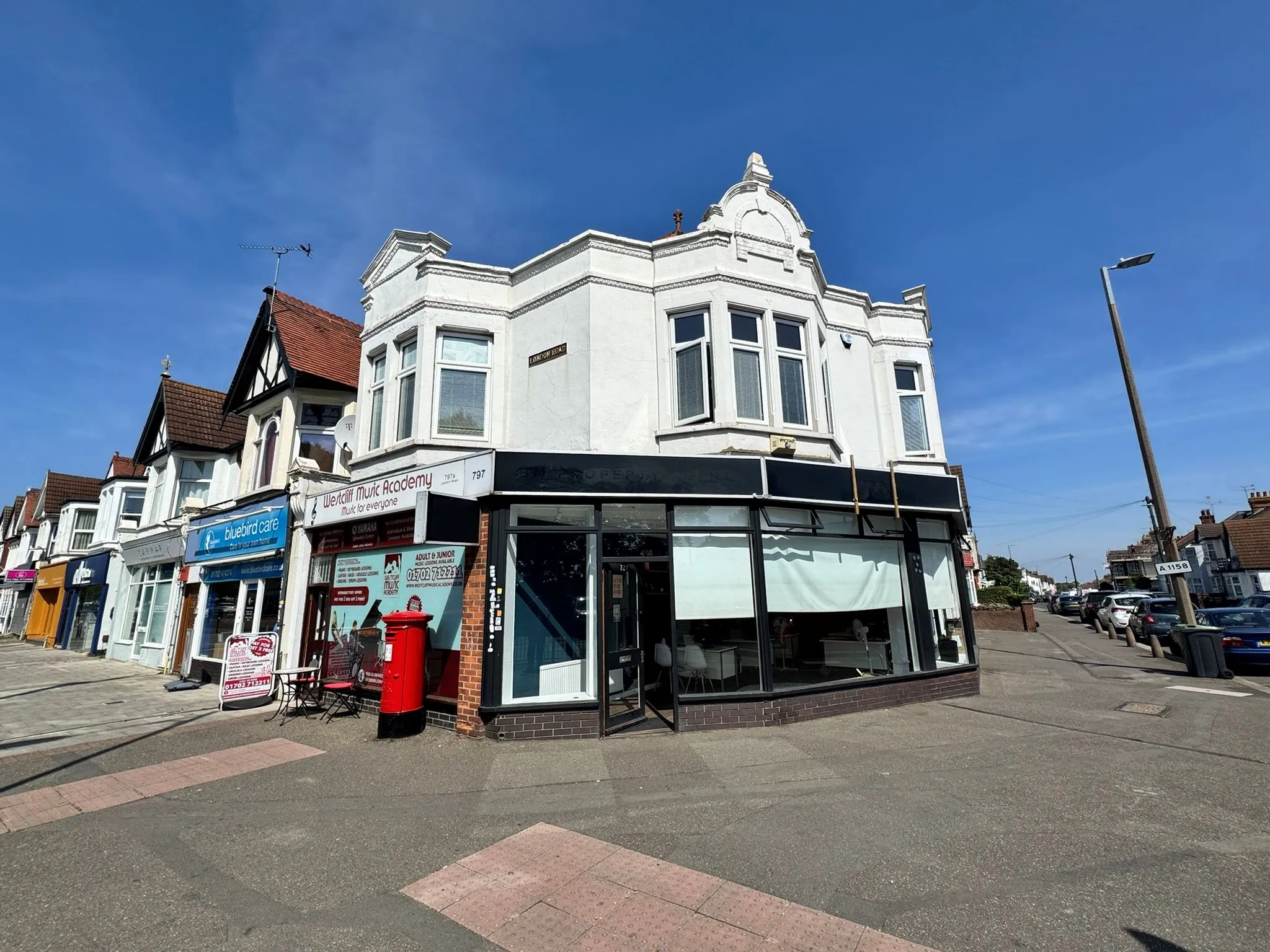 FREEHOLD MIXED USE INVESTMENT: CONSISTING OF FOUR COMMERCIAL UNITS AND ONE FIRST FLOOR OFFICE SUITE SITUATED ON A PROMINENT CORNER LOCATION