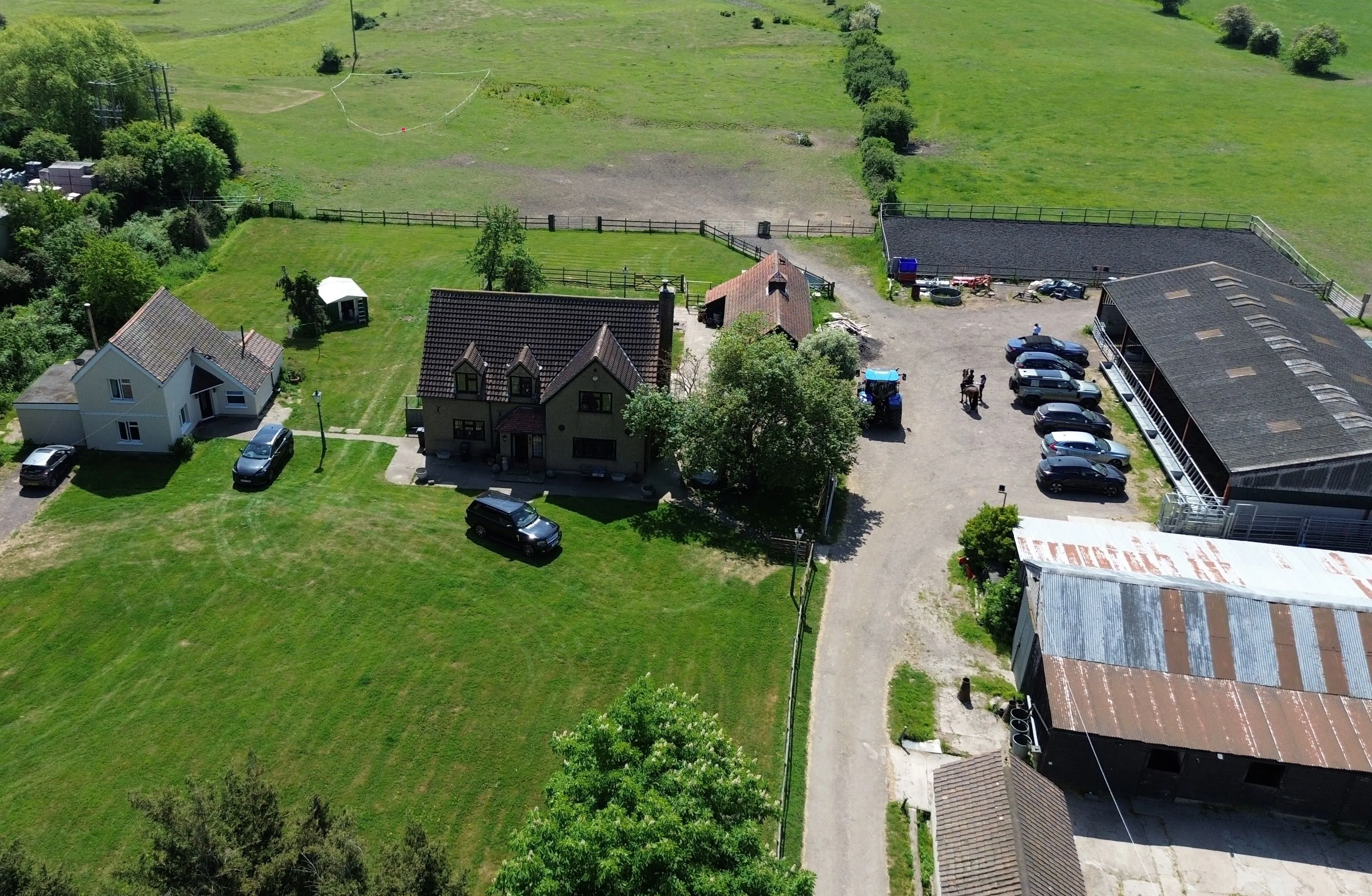FARM INVESTMENT: A FREEHOLD FARM SITUATED ON OVER 60 ACRES OF GRAZING LAND WITH TWO DETACHED FARM HOUSES AND A NUMBER OF OUTBUILDINGS