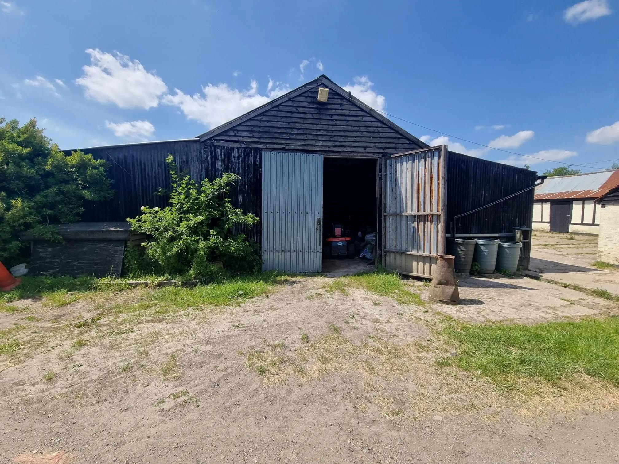 FARM INVESTMENT: A FREEHOLD FARM SITUATED ON OVER 60 ACRES OF GRAZING LAND WITH TWO DETACHED FARM HOUSES AND A NUMBER OF OUTBUILDINGS