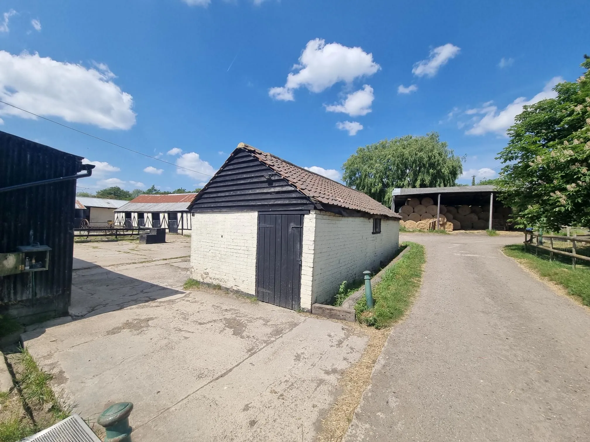 FARM INVESTMENT: A FREEHOLD FARM SITUATED ON OVER 60 ACRES OF GRAZING LAND WITH TWO DETACHED FARM HOUSES AND A NUMBER OF OUTBUILDINGS