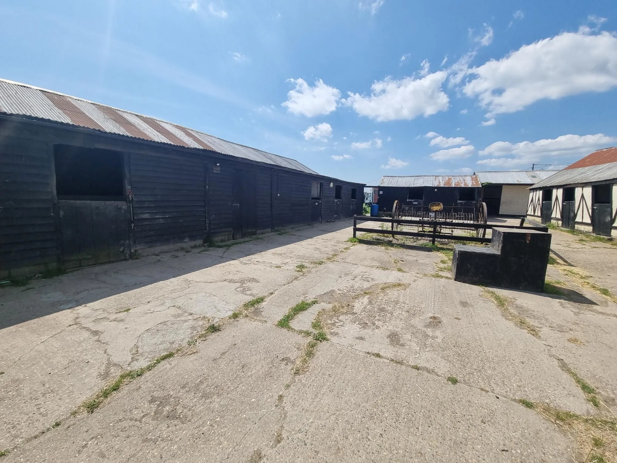 FARM INVESTMENT: A FREEHOLD FARM SITUATED ON OVER 60 ACRES OF GRAZING LAND WITH TWO DETACHED FARM HOUSES AND A NUMBER OF OUTBUILDINGS