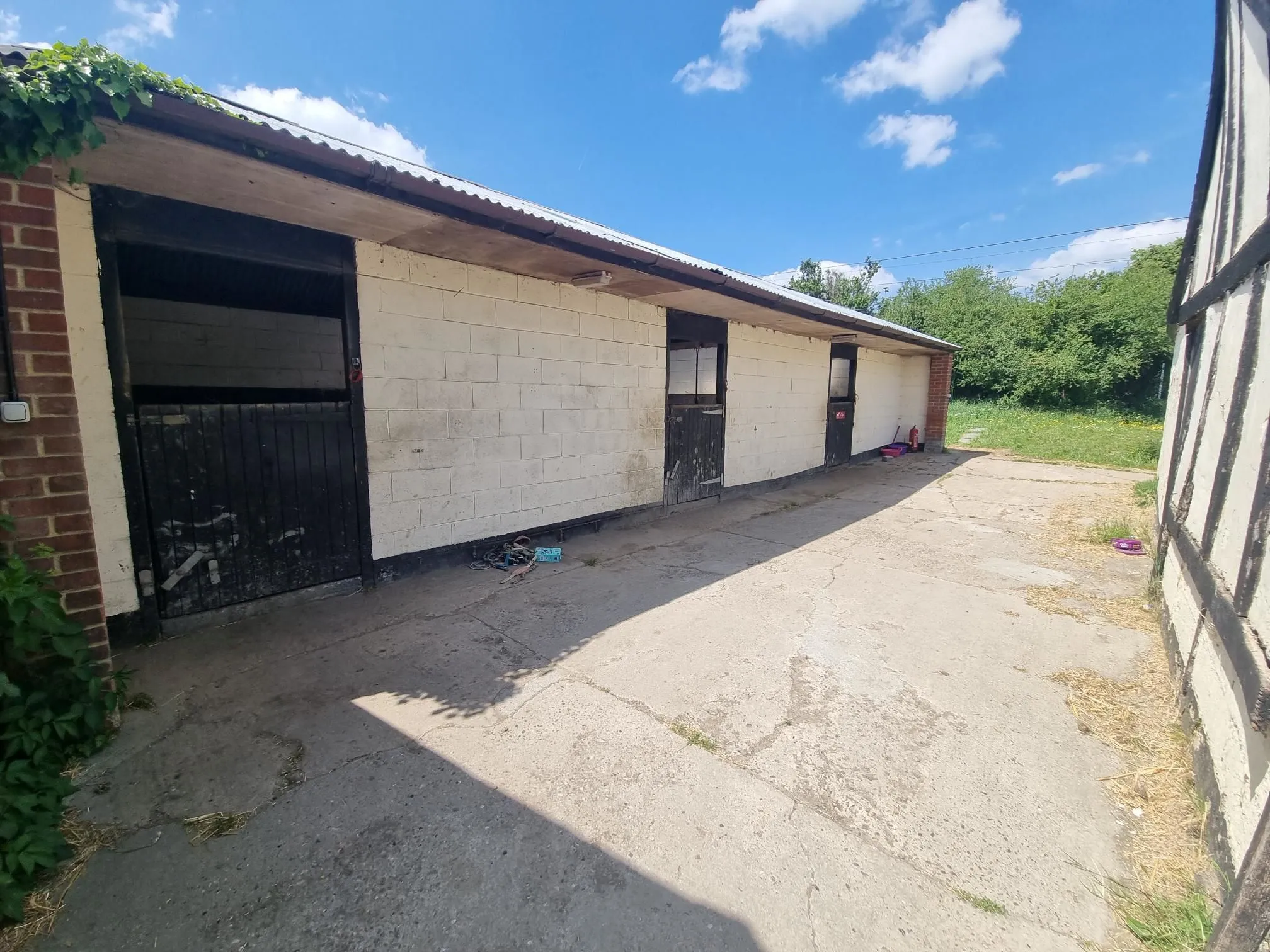 FARM INVESTMENT: A FREEHOLD FARM SITUATED ON OVER 60 ACRES OF GRAZING LAND WITH TWO DETACHED FARM HOUSES AND A NUMBER OF OUTBUILDINGS