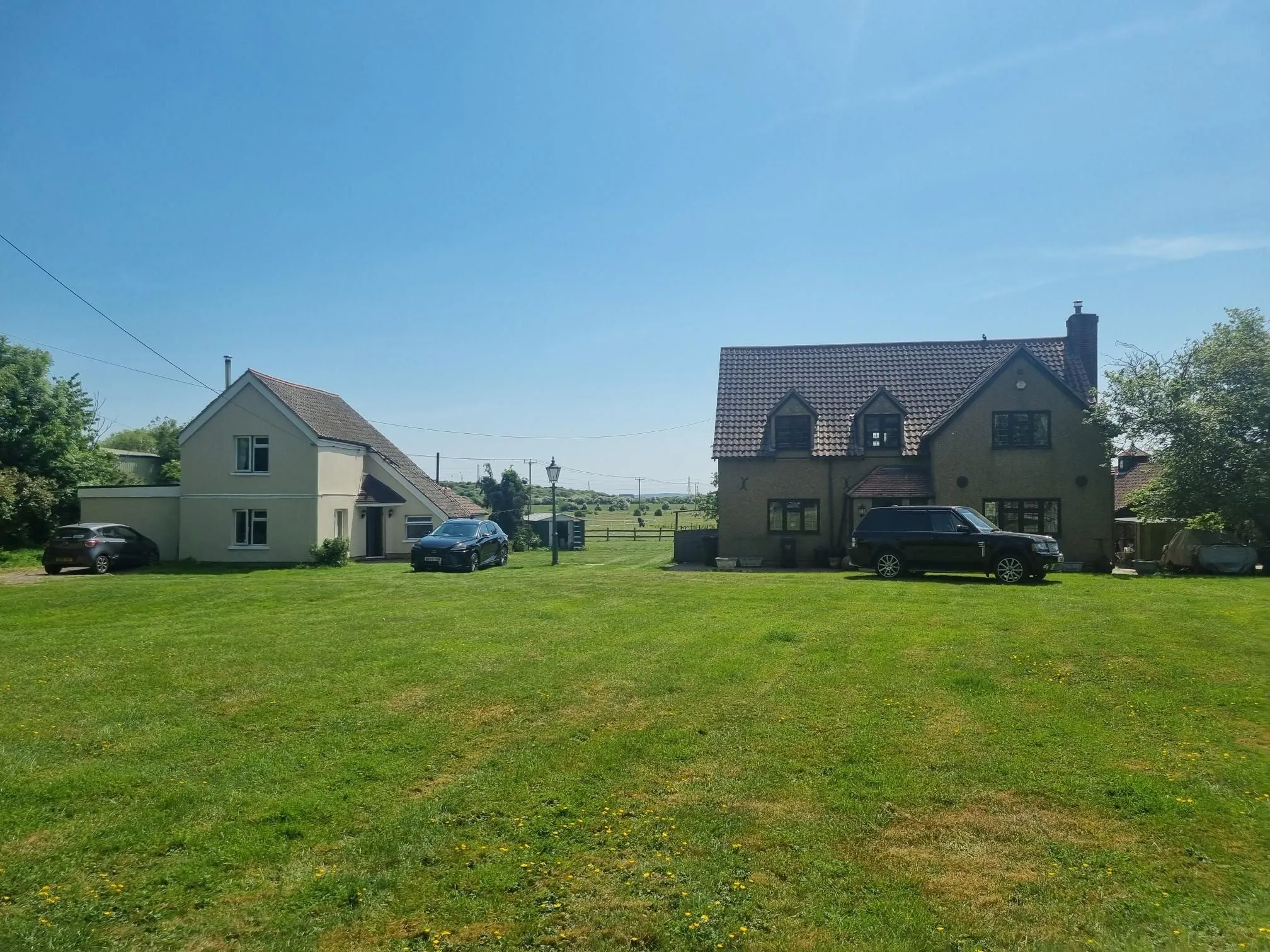 FARM INVESTMENT: A FREEHOLD FARM SITUATED ON OVER 60 ACRES OF GRAZING LAND WITH TWO DETACHED FARM HOUSES AND A NUMBER OF OUTBUILDINGS