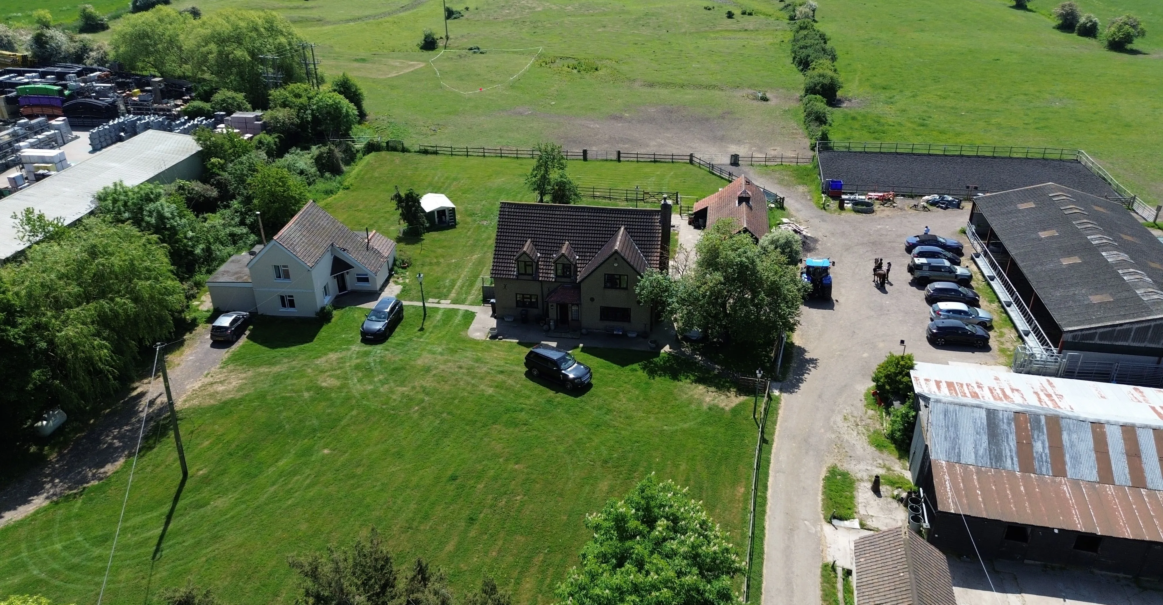 FARM INVESTMENT: A FREEHOLD FARM SITUATED ON OVER 60 ACRES OF GRAZING LAND WITH TWO DETACHED FARM HOUSES AND A NUMBER OF OUTBUILDINGS