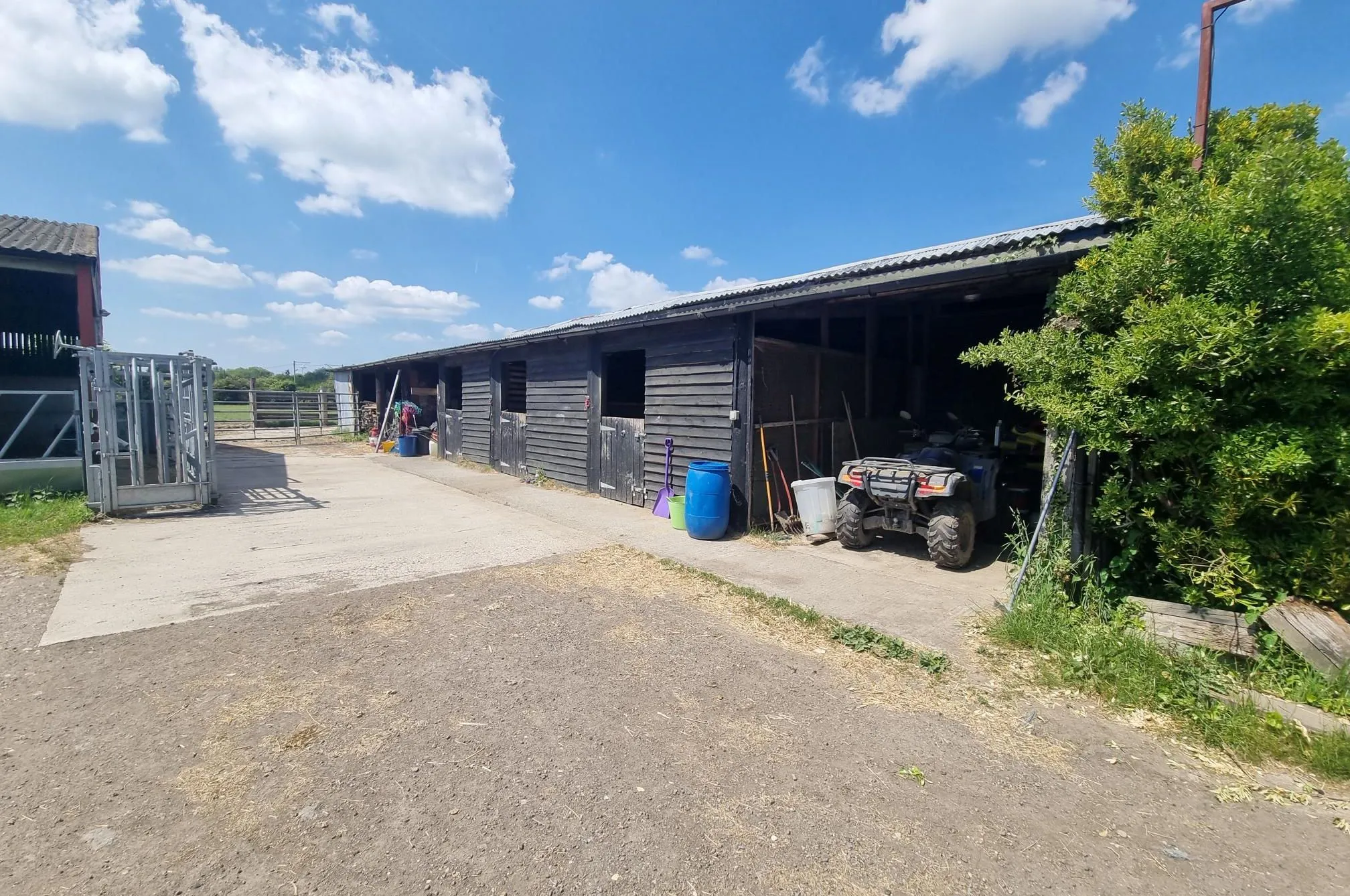 FARM INVESTMENT: A FREEHOLD FARM SITUATED ON OVER 60 ACRES OF GRAZING LAND WITH TWO DETACHED FARM HOUSES AND A NUMBER OF OUTBUILDINGS