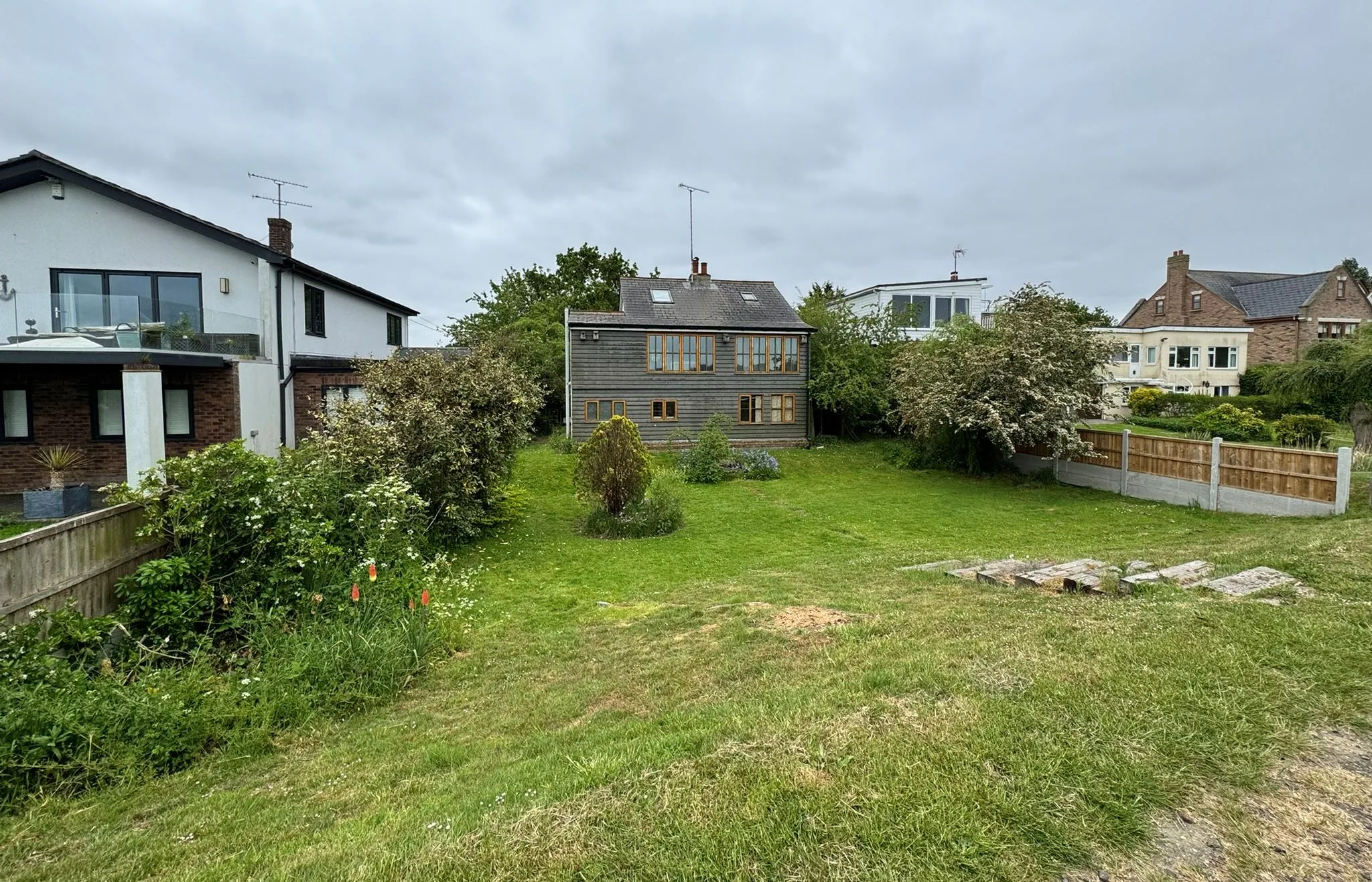 DEVELOPMENT POTENTIAL: VACANT FREEHOLD DETACHED CHALET ON 1/4 ACRE PLOT WITH RIVER FRONTED POSITION AND PRIVATE FIXED JETTY