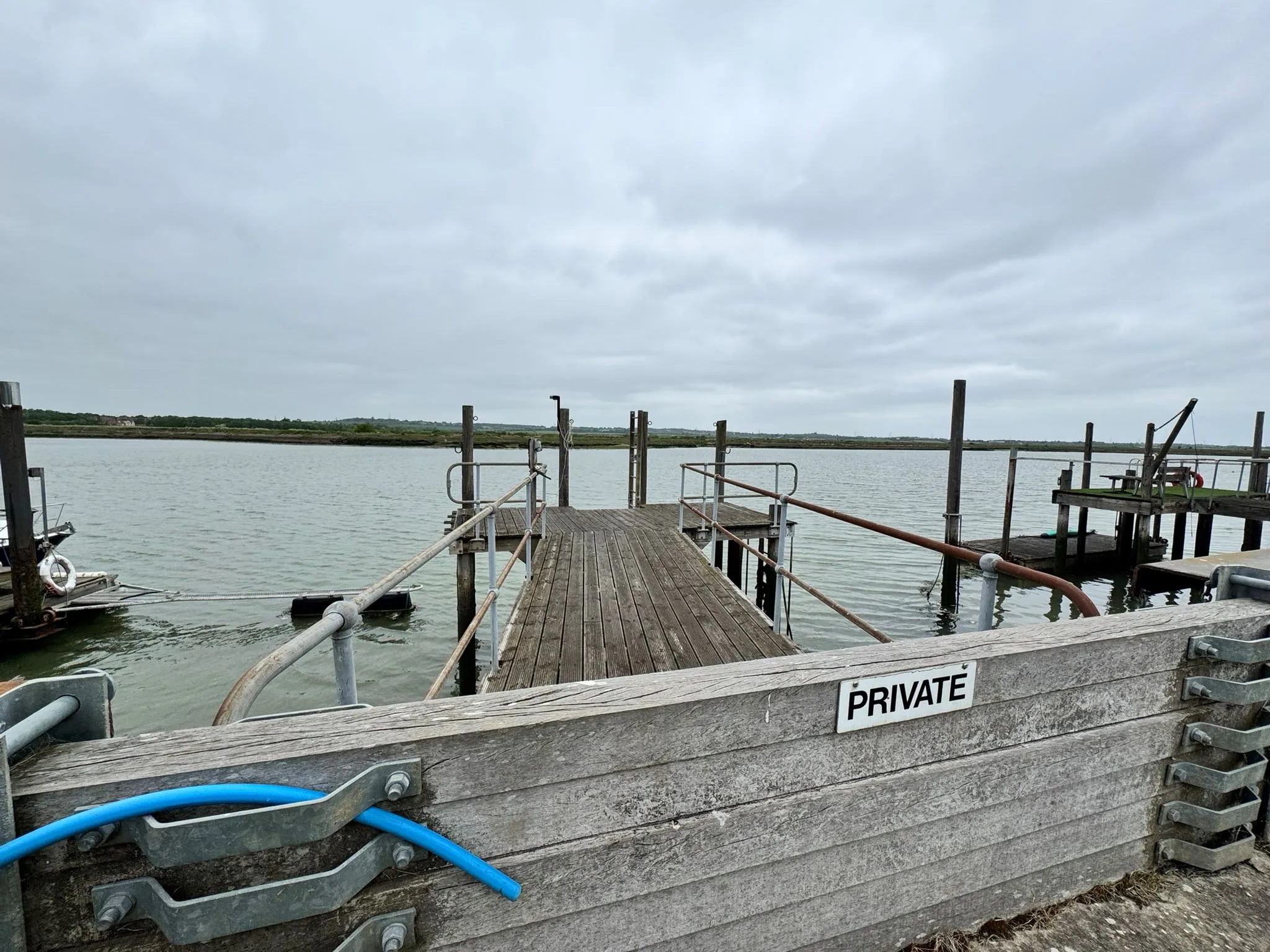 DEVELOPMENT POTENTIAL: VACANT FREEHOLD DETACHED CHALET ON 1/4 ACRE PLOT WITH RIVER FRONTED POSITION AND PRIVATE FIXED JETTY