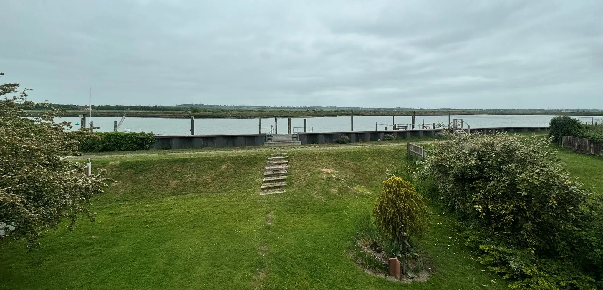 DEVELOPMENT POTENTIAL: VACANT FREEHOLD DETACHED CHALET ON 1/4 ACRE PLOT WITH RIVER FRONTED POSITION AND PRIVATE FIXED JETTY