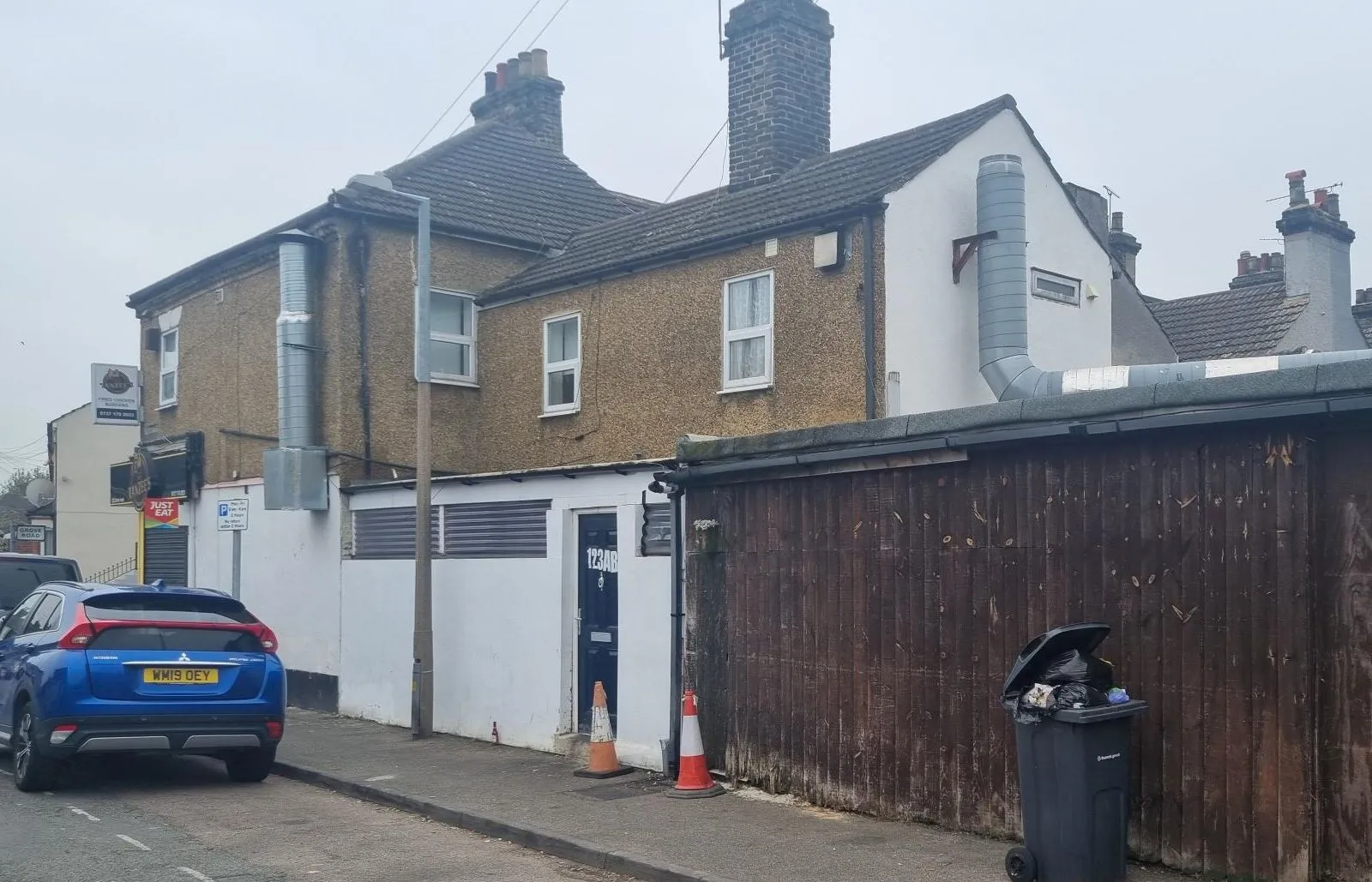 MIXED USE INVESTMENT: A FREEHOLD BUILDING COMPRISING A COMMERCIAL SHOP AND THREE FLATS LOCATED IN GRAYS PRODUCING AN ANNUAL INCOME OF £37,200