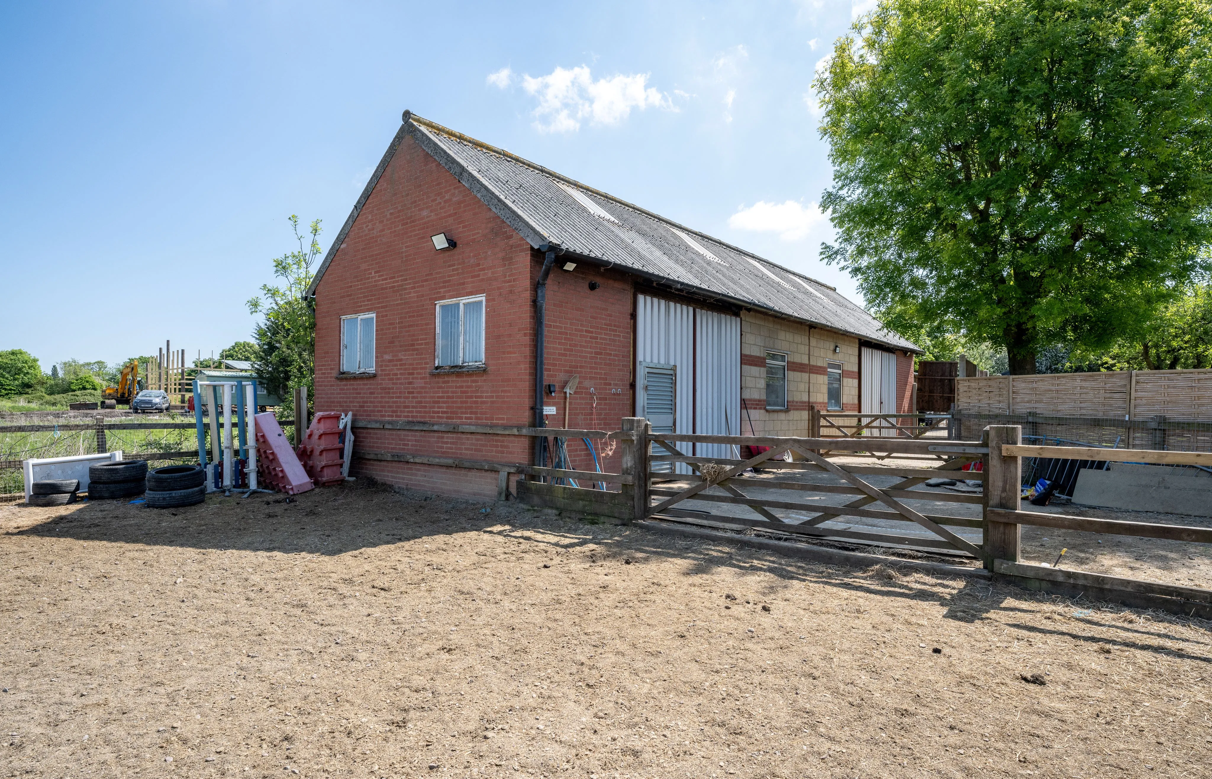 POTENTIAL DEVELOPMENT: A 2 ACRE PARCEL OF FREEHOLD LAND WITH ROAD ACCESS 1037 SQUARE FOOT BRICK BUILT BARN PLUS STRUCTURE FOR ADDITIONAL BUILDING